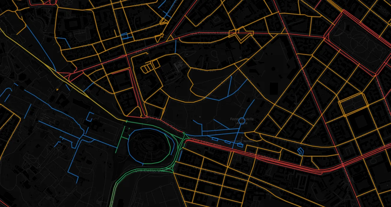 Dettagli di Street Smart Navigation sull'area del Colosseo: in verde le piste ciclabili, in blu le aree con maggiore presenza di pedoni e in giallo e rosso le strade percorribili con dveriùso gral di difficoltà
