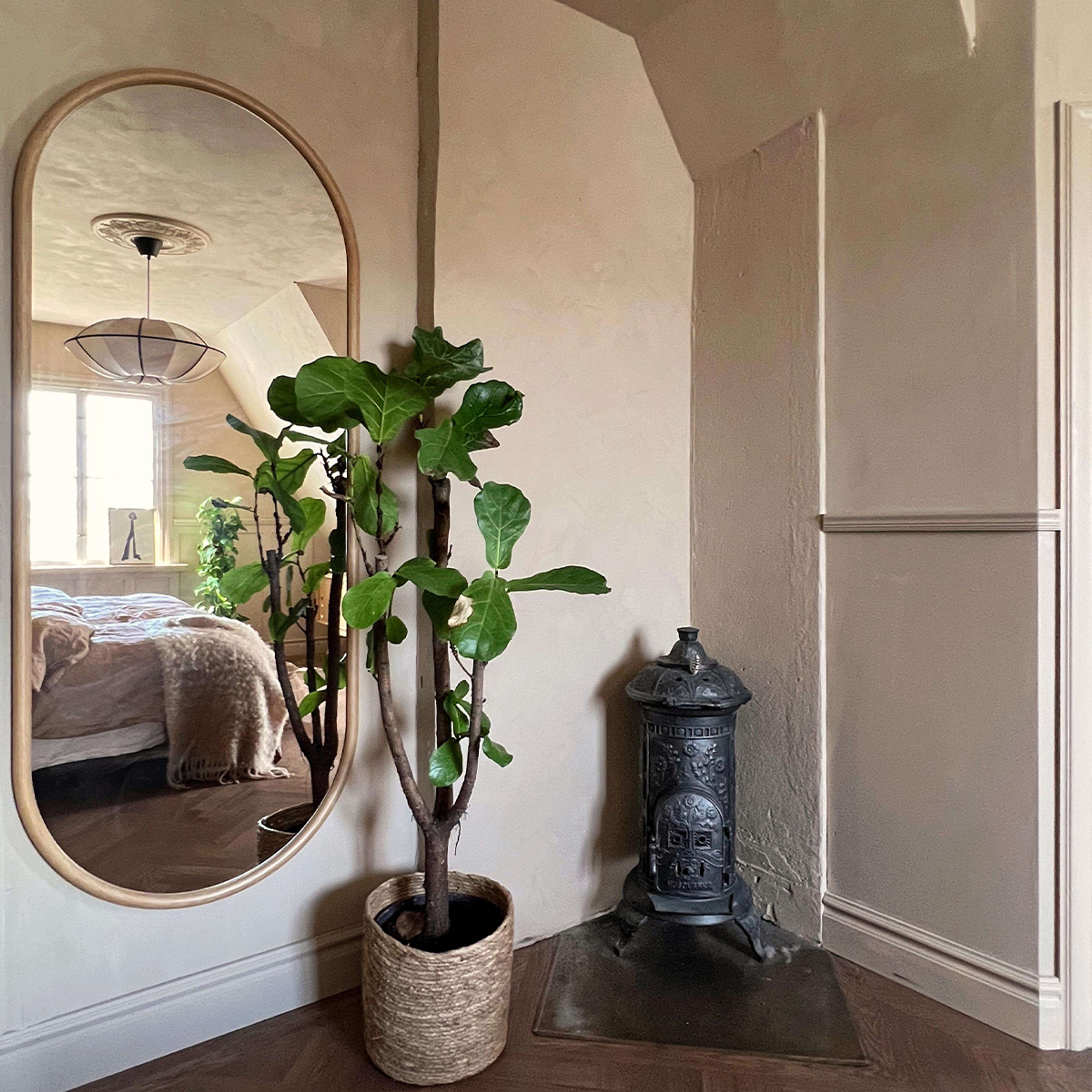 A room corner featuring an oval mirror reflecting a bed, a large fiddle-leaf fig plant in a basket, and a small, ornate cast iron stove.​​​​‌﻿‍﻿​‍​‍‌‍﻿﻿‌﻿​‍‌‍‍‌‌‍‌﻿‌‍‍‌‌‍﻿‍​‍​‍​﻿‍‍​‍​‍‌﻿​﻿‌‍​‌‌‍﻿‍‌‍‍‌‌﻿‌​‌﻿‍‌​‍﻿‍‌‍‍‌‌‍﻿﻿​‍​‍​‍﻿​​‍​‍‌‍‍​‌﻿​‍‌‍‌‌‌‍‌‍​‍​‍​﻿‍‍​‍​‍‌‍‍​‌﻿‌​‌﻿‌​‌﻿​​‌﻿​﻿​﻿‍‍​‍﻿﻿​‍﻿﻿‌﻿‌﻿‌﻿‌﻿‌﻿‌﻿​‍﻿‍‌‍​﻿‌‍﻿﻿‌‍﻿​‌‍﻿﻿‌﻿​‍‌‍​‌‌‍﻿‌‌‍​‌​‍﻿‍‌﻿​﻿‌‍‌‌​‍﻿﻿‌﻿​﻿‌﻿‌​‌﻿‌‌‌‍‌​‌‍‍‌‌‍﻿﻿​‍﻿﻿‌‍‍‌‌‍﻿‍‌﻿‌​‌‍‌‌‌‍﻿‍‌﻿‌​​‍﻿﻿‌‍‌‌‌‍‌​‌‍‍‌‌﻿‌​​‍﻿﻿‌‍﻿‌‌‍﻿﻿‌‍‌​‌‍‌‌​﻿﻿‌‌﻿​​‌﻿​‍‌‍‌‌‌﻿​﻿‌‍‌‌‌‍﻿‍‌﻿‌​‌‍​‌‌﻿‌​‌‍‍‌‌‍﻿﻿‌‍﻿‍​﻿‍﻿‌‍‍‌‌‍‌​​﻿﻿‌​﻿‍​‌‍​‌​﻿​﻿​﻿‌‍​﻿​​​﻿​‍​﻿‌﻿‌‍‌​​‍﻿‌​﻿​‍​﻿​‍‌‍​‌‌‍‌​​‍﻿‌​﻿‌​​﻿‍​​﻿‍​​﻿‌‌​‍﻿‌‌‍​‌‌‍​‍​﻿‌​‌‍​‌​‍﻿‌​﻿​‍​﻿‌​‌‍​‍​﻿‌﻿‌‍‌‌‌‍​﻿​﻿‌‌​﻿‌​‌‍‌‍​﻿‍‌​﻿‌​​﻿‍‌​﻿‍﻿‌﻿‌​‌﻿‍‌‌﻿​​‌‍‌‌​﻿﻿‌‌‍​﻿‌‍﻿﻿‌‍﻿‍‌﻿‌​‌‍‌‌‌‍﻿‍‌﻿‌​‌‌​​‌‍​‌‌‍‌﻿‌‍‌‌​﻿‍﻿‌﻿​​‌‍​‌‌﻿‌​‌‍‍​​﻿﻿‌‌‍​﻿‌‍﻿﻿‌‍﻿‍‌﻿‌​‌‍‌‌‌‍﻿‍‌﻿‌​‌​​‍‌‍﻿​‌‍﻿﻿‌‍​﻿‌‍‍﻿‌﻿​﻿​‍‌‌​﻿‌‌‌​​‍‌‌﻿﻿‌‍‍﻿‌‍‌‌‌﻿‍‌​‍‌‌​﻿​﻿‌​‌​​‍‌‌​﻿​﻿‌​‌​​‍‌‌​﻿​‍​﻿​‍‌‍​‍​﻿​‍​﻿‍​‌‍‌‌​﻿‌‍​﻿​﻿​﻿​﻿‌‍‌‌​﻿‌‌​﻿​​‌‍‌‌​﻿​‍​‍‌‌​﻿​‍​﻿​‍​‍‌‌​﻿‌‌‌​‌​​‍﻿‍‌‍‍‌‌﻿‌​‌‍‌‌‌‍﻿‌‌﻿​﻿​‍‌‌​﻿‌‌‌​​‍‌‌﻿﻿‌‍‍﻿‌‍‌‌‌﻿‍‌​‍‌‌​﻿​﻿‌​‌​​‍‌‌​﻿​﻿‌​‌​​‍‌‌​﻿​‍​﻿​‍‌‍​‍​﻿‌﻿​﻿​﻿​﻿‌​​﻿‌​‌‍‌‍​﻿‌‍‌‍‌‌​﻿​‍​﻿‌‌​﻿​‍​﻿‍​​‍‌‌​﻿​‍​﻿​‍​‍‌‌​﻿‌‌‌​‌​​‍﻿‍‌‍﻿‌‌‍‌‌‌‍‌​‌‍‍‌‌‍​‌​‍﻿‍‌‍‍‌‌‍﻿‌‌‍​‌‌‍‌﻿‌‍‌‌​‍﻿‍‌‍​‌‌‍﻿​‌﻿‌​‌‌‌​‌‍‌‌‌﻿‍​‌﻿‌​​﻿﻿﻿‌‍​‍‌‍​‌‌﻿​﻿‌‍‌‌‌‌‌‌‌﻿​‍‌‍﻿​​﻿﻿‌‌‍‍​‌﻿‌​‌﻿‌​‌﻿​​‌﻿​﻿​‍‌‌​﻿​﻿‌​​‌​‍‌‌​﻿​‍‌​‌‍​‍‌‌​﻿​‍‌​‌‍‌﻿‌﻿‌﻿‌﻿‌﻿‌﻿​‍﻿‍‌‍​﻿‌‍﻿﻿‌‍﻿​‌‍﻿﻿‌﻿​‍‌‍​‌‌‍﻿‌‌‍​‌​‍﻿‍‌﻿​﻿‌‍‌‌​‍‌‌​﻿​‍‌​‌‍‌﻿​﻿‌﻿‌​‌﻿‌‌‌‍‌​‌‍‍‌‌‍﻿﻿​‍‌‍‌‍‍‌‌‍‌​​﻿﻿‌​﻿‍​‌‍​‌​﻿​﻿​﻿‌‍​﻿​​​﻿​‍​﻿‌﻿‌‍‌​​‍﻿‌​﻿​‍​﻿​‍‌‍​‌‌‍‌​​‍﻿‌​﻿‌​​﻿‍​​﻿‍​​﻿‌‌​‍﻿‌‌‍​‌‌‍​‍​﻿‌​‌‍​‌​‍﻿‌​﻿​‍​﻿‌​‌‍​‍​﻿‌﻿‌‍‌‌‌‍​﻿​﻿‌‌​﻿‌​‌‍‌‍​﻿‍‌​﻿‌​​﻿‍‌​‍‌‍‌﻿‌​‌﻿‍‌‌﻿​​‌‍‌‌​﻿﻿‌‌‍​﻿‌‍﻿﻿‌‍﻿‍‌﻿‌​‌‍‌‌‌‍﻿‍‌﻿‌​‌‌​​‌‍​‌‌‍‌﻿‌‍‌‌​‍‌‍‌﻿​​‌‍​‌‌﻿‌​‌‍‍​​﻿﻿‌‌‍​﻿‌‍﻿﻿‌‍﻿‍‌﻿‌​‌‍‌‌‌‍﻿‍‌﻿‌​‌​​‍‌‍﻿​‌‍﻿﻿‌‍​﻿‌‍‍﻿‌﻿​﻿​‍‌‌​﻿‌‌‌​​‍‌‌﻿﻿‌‍‍﻿‌‍‌‌‌﻿‍‌​‍‌‌​﻿​﻿‌​‌​​‍‌‌​﻿​﻿‌​‌​​‍‌‌​﻿​‍​﻿​‍‌‍​‍​﻿​‍​﻿‍​‌‍‌‌​﻿‌‍​﻿​﻿​﻿​﻿‌‍‌‌​﻿‌‌​﻿​​‌‍‌‌​﻿​‍​‍‌‌​﻿​‍​﻿​‍​‍‌‌​﻿‌‌‌​‌​​‍﻿‍‌‍‍‌‌﻿‌​‌‍‌‌‌‍﻿‌‌﻿​﻿​‍‌‌​﻿‌‌‌​​‍‌‌﻿﻿‌‍‍﻿‌‍‌‌‌﻿‍‌​‍‌‌​﻿​﻿‌​‌​​‍‌‌​﻿​﻿‌​‌​​‍‌‌​﻿​‍​﻿​‍‌‍​‍​﻿‌﻿​﻿​﻿​﻿‌​​﻿‌​‌‍‌‍​﻿‌‍‌‍‌‌​﻿​‍​﻿‌‌​﻿​‍​﻿‍​​‍‌‌​﻿​‍​﻿​‍​‍‌‌​﻿‌‌‌​‌​​‍﻿‍‌‍﻿‌‌‍‌‌‌‍‌​‌‍‍‌‌‍​‌​‍﻿‍‌‍‍‌‌‍﻿‌‌‍​‌‌‍‌﻿‌‍‌‌​‍﻿‍‌‍​‌‌‍﻿​‌﻿‌​‌‌‌​‌‍‌‌‌﻿‍​‌﻿‌​​‍‌‍‌﻿​​‌‍‌‌‌﻿​‍‌﻿​﻿‌﻿​​‌‍‌‌‌‍​﻿‌﻿‌​‌‍‍‌‌﻿‌‍‌‍‌‌​﻿﻿‌‌﻿​​‌﻿‌‌‌‍​‍‌‍﻿​‌‍‍‌‌﻿​﻿‌‍‍​‌‍‌‌‌‍‌​​‍​‍‌﻿﻿‌