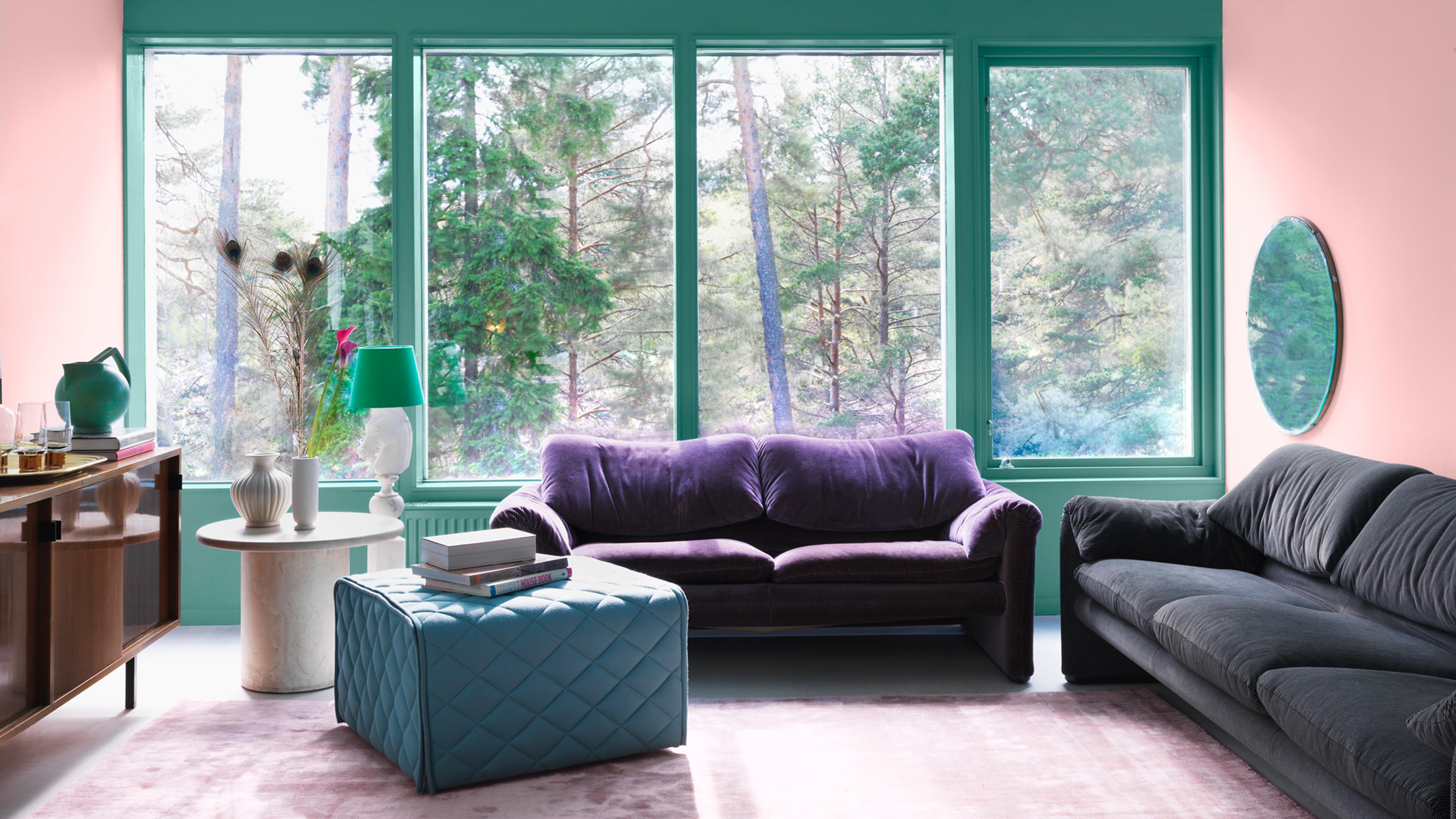 A modern living room with pink walls, teal window frames, a forest view through large windows, purple and dark gray sofas, and a teal ottoman.​​​​‌﻿‍﻿​‍​‍‌‍﻿﻿‌﻿​‍‌‍‍‌‌‍‌﻿‌‍‍‌‌‍﻿‍​‍​‍​﻿‍‍​‍​‍‌﻿​﻿‌‍​‌‌‍﻿‍‌‍‍‌‌﻿‌​‌﻿‍‌​‍﻿‍‌‍‍‌‌‍﻿﻿​‍​‍​‍﻿​​‍​‍‌‍‍​‌﻿​‍‌‍‌‌‌‍‌‍​‍​‍​﻿‍‍​‍​‍‌‍‍​‌﻿‌​‌﻿‌​‌﻿​​‌﻿​﻿​﻿‍‍​‍﻿﻿​‍﻿﻿‌﻿‌﻿‌﻿‌﻿‌﻿‌﻿​‍﻿‍‌‍​﻿‌‍﻿﻿‌‍﻿​‌‍﻿﻿‌﻿​‍‌‍​‌‌‍﻿‌‌‍​‌​‍﻿‍‌﻿​﻿‌‍‌‌​‍﻿﻿‌﻿​﻿‌﻿‌​‌﻿‌‌‌‍‌​‌‍‍‌‌‍﻿﻿​‍﻿﻿‌‍‍‌‌‍﻿‍‌﻿‌​‌‍‌‌‌‍﻿‍‌﻿‌​​‍﻿﻿‌‍‌‌‌‍‌​‌‍‍‌‌﻿‌​​‍﻿﻿‌‍﻿‌‌‍﻿﻿‌‍‌​‌‍‌‌​﻿﻿‌‌﻿​​‌﻿​‍‌‍‌‌‌﻿​﻿‌‍‌‌‌‍﻿‍‌﻿‌​‌‍​‌‌﻿‌​‌‍‍‌‌‍﻿﻿‌‍﻿‍​﻿‍﻿‌‍‍‌‌‍‌​​﻿﻿‌​﻿‍​‌‍​﻿​﻿​​​﻿​﻿‌‍‌‍‌‍‌​​﻿‌​​﻿‍‌​‍﻿‌​﻿​﻿‌‍​﻿​﻿​﻿‌‍​‌​‍﻿‌​﻿‌​​﻿​‍‌‍​﻿​﻿‌﻿​‍﻿‌​﻿‍​‌‍‌​‌‍‌‍​﻿‍‌​‍﻿‌‌‍​‌​﻿‌‍‌‍​‌​﻿‍​​﻿​​​﻿​​​﻿‌‍‌‍‌‍​﻿‌‍​﻿‌​​﻿‍‌​﻿‌﻿​﻿‍﻿‌﻿‌​‌﻿‍‌‌﻿​​‌‍‌‌​﻿﻿‌‌‍​﻿‌‍﻿﻿‌‍﻿‍‌﻿‌​‌‍‌‌‌‍﻿‍‌﻿‌​‌‌​​‌‍​‌‌‍‌﻿‌‍‌‌​﻿‍﻿‌﻿​​‌‍​‌‌﻿‌​‌‍‍​​﻿﻿‌‌‍​﻿‌‍﻿﻿‌‍﻿‍‌﻿‌​‌‍‌‌‌‍﻿‍‌﻿‌​‌​​‍‌‍﻿​‌‍﻿﻿‌‍​﻿‌‍‍﻿‌﻿​﻿​‍‌‌​﻿‌‌‌​​‍‌‌﻿﻿‌‍‍﻿‌‍‌‌‌﻿‍‌​‍‌‌​﻿​﻿‌​‌​​‍‌‌​﻿​﻿‌​‌​​‍‌‌​﻿​‍​﻿​‍‌‍​‍​﻿​‍‌‍‌‌‌‍‌‍​﻿​‌​﻿​​​﻿‍‌‌‍​‌‌‍‌‍​﻿‌‌​﻿‌​‌‍​‍​‍‌‌​﻿​‍​﻿​‍​‍‌‌​﻿‌‌‌​‌​​‍﻿‍‌‍‍‌‌﻿‌​‌‍‌‌‌‍﻿‌‌﻿​﻿​‍‌‌​﻿‌‌‌​​‍‌‌﻿﻿‌‍‍﻿‌‍‌‌‌﻿‍‌​‍‌‌​﻿​﻿‌​‌​​‍‌‌​﻿​﻿‌​‌​​‍‌‌​﻿​‍​﻿​‍​﻿‌‍​﻿​﻿​﻿‍‌​﻿‍‌‌‍‌‌‌‍​‍​﻿​‍​﻿‌‍​﻿​﻿‌‍​‍‌‍‌‌‌‍‌‍​‍‌‌​﻿​‍​﻿​‍​‍‌‌​﻿‌‌‌​‌​​‍﻿‍‌‍﻿‌‌‍‌‌‌‍‌​‌‍‍‌‌‍​‌​‍﻿‍‌‍‍‌‌‍﻿‌‌‍​‌‌‍‌﻿‌‍‌‌​‍﻿‍‌‍​‌‌‍﻿​‌﻿‌​‌‌‌​‌‍‌‌‌﻿‍​‌﻿‌​​﻿﻿﻿‌‍​‍‌‍​‌‌﻿​﻿‌‍‌‌‌‌‌‌‌﻿​‍‌‍﻿​​﻿﻿‌‌‍‍​‌﻿‌​‌﻿‌​‌﻿​​‌﻿​﻿​‍‌‌​﻿​﻿‌​​‌​‍‌‌​﻿​‍‌​‌‍​‍‌‌​﻿​‍‌​‌‍‌﻿‌﻿‌﻿‌﻿‌﻿‌﻿​‍﻿‍‌‍​﻿‌‍﻿﻿‌‍﻿​‌‍﻿﻿‌﻿​‍‌‍​‌‌‍﻿‌‌‍​‌​‍﻿‍‌﻿​﻿‌‍‌‌​‍‌‌​﻿​‍‌​‌‍‌﻿​﻿‌﻿‌​‌﻿‌‌‌‍‌​‌‍‍‌‌‍﻿﻿​‍‌‍‌‍‍‌‌‍‌​​﻿﻿‌​﻿‍​‌‍​﻿​﻿​​​﻿​﻿‌‍‌‍‌‍‌​​﻿‌​​﻿‍‌​‍﻿‌​﻿​﻿‌‍​﻿​﻿​﻿‌‍​‌​‍﻿‌​﻿‌​​﻿​‍‌‍​﻿​﻿‌﻿​‍﻿‌​﻿‍​‌‍‌​‌‍‌‍​﻿‍‌​‍﻿‌‌‍​‌​﻿‌‍‌‍​‌​﻿‍​​﻿​​​﻿​​​﻿‌‍‌‍‌‍​﻿‌‍​﻿‌​​﻿‍‌​﻿‌﻿​‍‌‍‌﻿‌​‌﻿‍‌‌﻿​​‌‍‌‌​﻿﻿‌‌‍​﻿‌‍﻿﻿‌‍﻿‍‌﻿‌​‌‍‌‌‌‍﻿‍‌﻿‌​‌‌​​‌‍​‌‌‍‌﻿‌‍‌‌​‍‌‍‌﻿​​‌‍​‌‌﻿‌​‌‍‍​​﻿﻿‌‌‍​﻿‌‍﻿﻿‌‍﻿‍‌﻿‌​‌‍‌‌‌‍﻿‍‌﻿‌​‌​​‍‌‍﻿​‌‍﻿﻿‌‍​﻿‌‍‍﻿‌﻿​﻿​‍‌‌​﻿‌‌‌​​‍‌‌﻿﻿‌‍‍﻿‌‍‌‌‌﻿‍‌​‍‌‌​﻿​﻿‌​‌​​‍‌‌​﻿​﻿‌​‌​​‍‌‌​﻿​‍​﻿​‍‌‍​‍​﻿​‍‌‍‌‌‌‍‌‍​﻿​‌​﻿​​​﻿‍‌‌‍​‌‌‍‌‍​﻿‌‌​﻿‌​‌‍​‍​‍‌‌​﻿​‍​﻿​‍​‍‌‌​﻿‌‌‌​‌​​‍﻿‍‌‍‍‌‌﻿‌​‌‍‌‌‌‍﻿‌‌﻿​﻿​‍‌‌​﻿‌‌‌​​‍‌‌﻿﻿‌‍‍﻿‌‍‌‌‌﻿‍‌​‍‌‌​﻿​﻿‌​‌​​‍‌‌​﻿​﻿‌​‌​​‍‌‌​﻿​‍​﻿​‍​﻿‌‍​﻿​﻿​﻿‍‌​﻿‍‌‌‍‌‌‌‍​‍​﻿​‍​﻿‌‍​﻿​﻿‌‍​‍‌‍‌‌‌‍‌‍​‍‌‌​﻿​‍​﻿​‍​‍‌‌​﻿‌‌‌​‌​​‍﻿‍‌‍﻿‌‌‍‌‌‌‍‌​‌‍‍‌‌‍​‌​‍﻿‍‌‍‍‌‌‍﻿‌‌‍​‌‌‍‌﻿‌‍‌‌​‍﻿‍‌‍​‌‌‍﻿​‌﻿‌​‌‌‌​‌‍‌‌‌﻿‍​‌﻿‌​​‍‌‍‌﻿​​‌‍‌‌‌﻿​‍‌﻿​﻿‌﻿​​‌‍‌‌‌‍​﻿‌﻿‌​‌‍‍‌‌﻿‌‍‌‍‌‌​﻿﻿‌‌﻿​​‌﻿‌‌‌‍​‍‌‍﻿​‌‍‍‌‌﻿​﻿‌‍‍​‌‍‌‌‌‍‌​​‍​‍‌﻿﻿‌