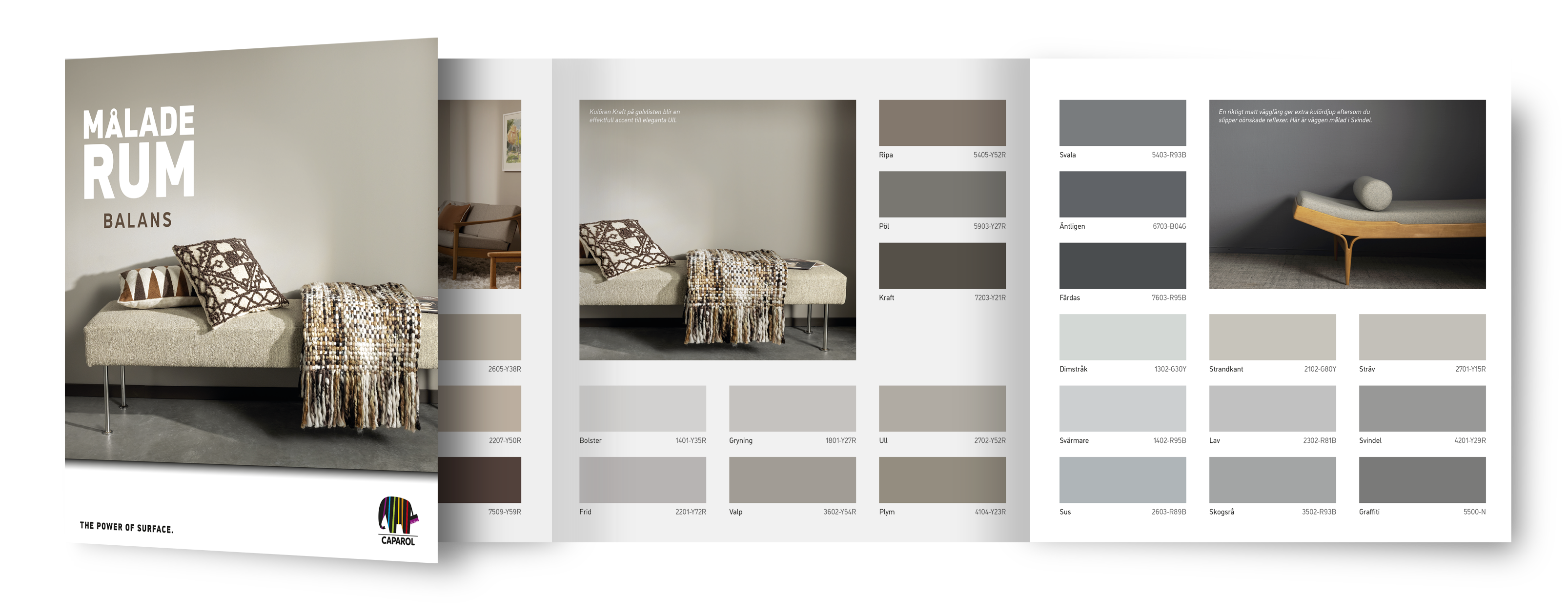 Open paint catalog displaying swatches of neutral and gray paint colors with example room interiors.