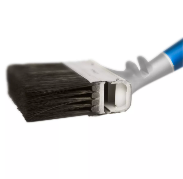 A paint brush with dark bristles and a blue handle.