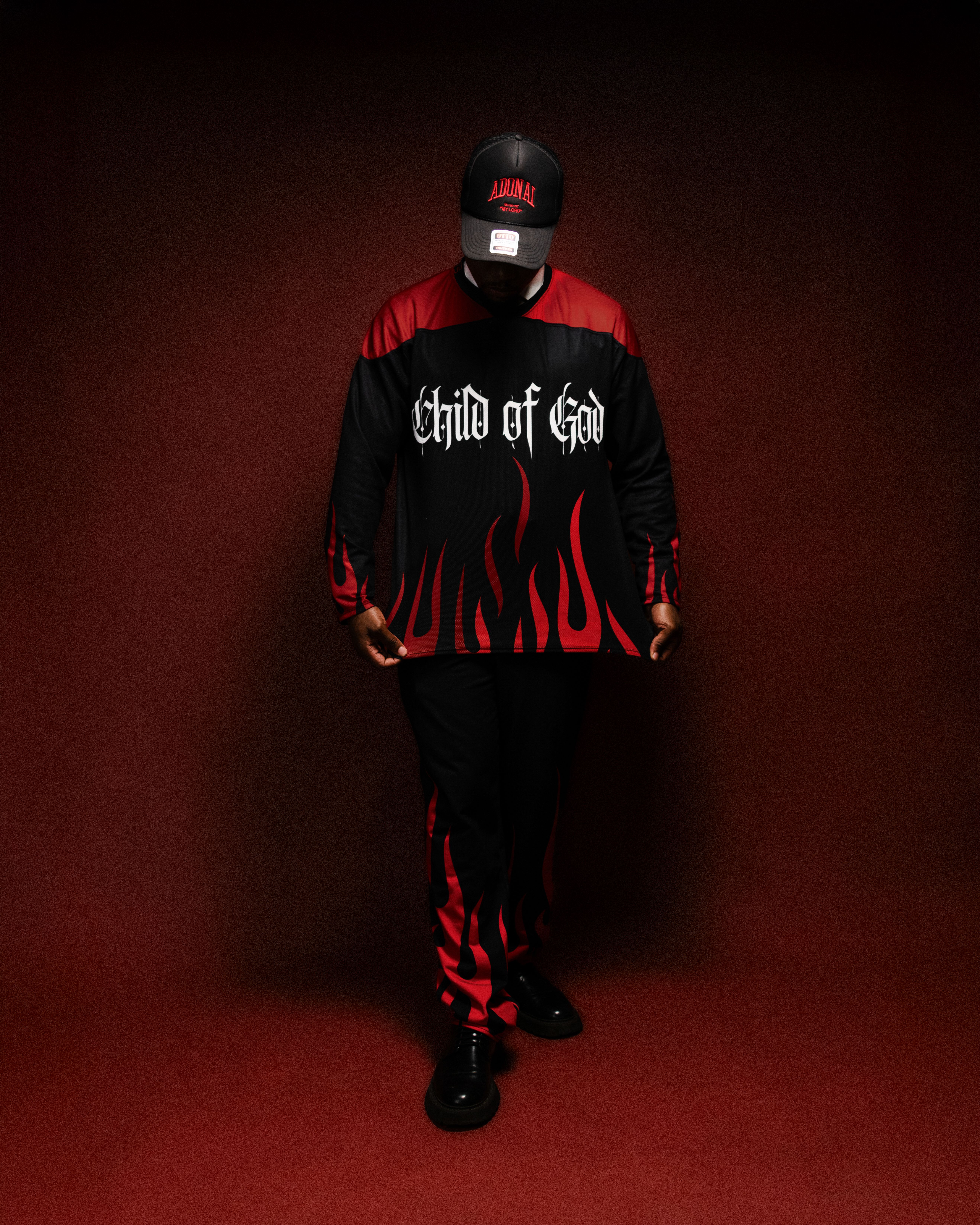 Christian streetwear brand portrait of Jean-Samuel representing faith, identity, and GODMADE clothing.