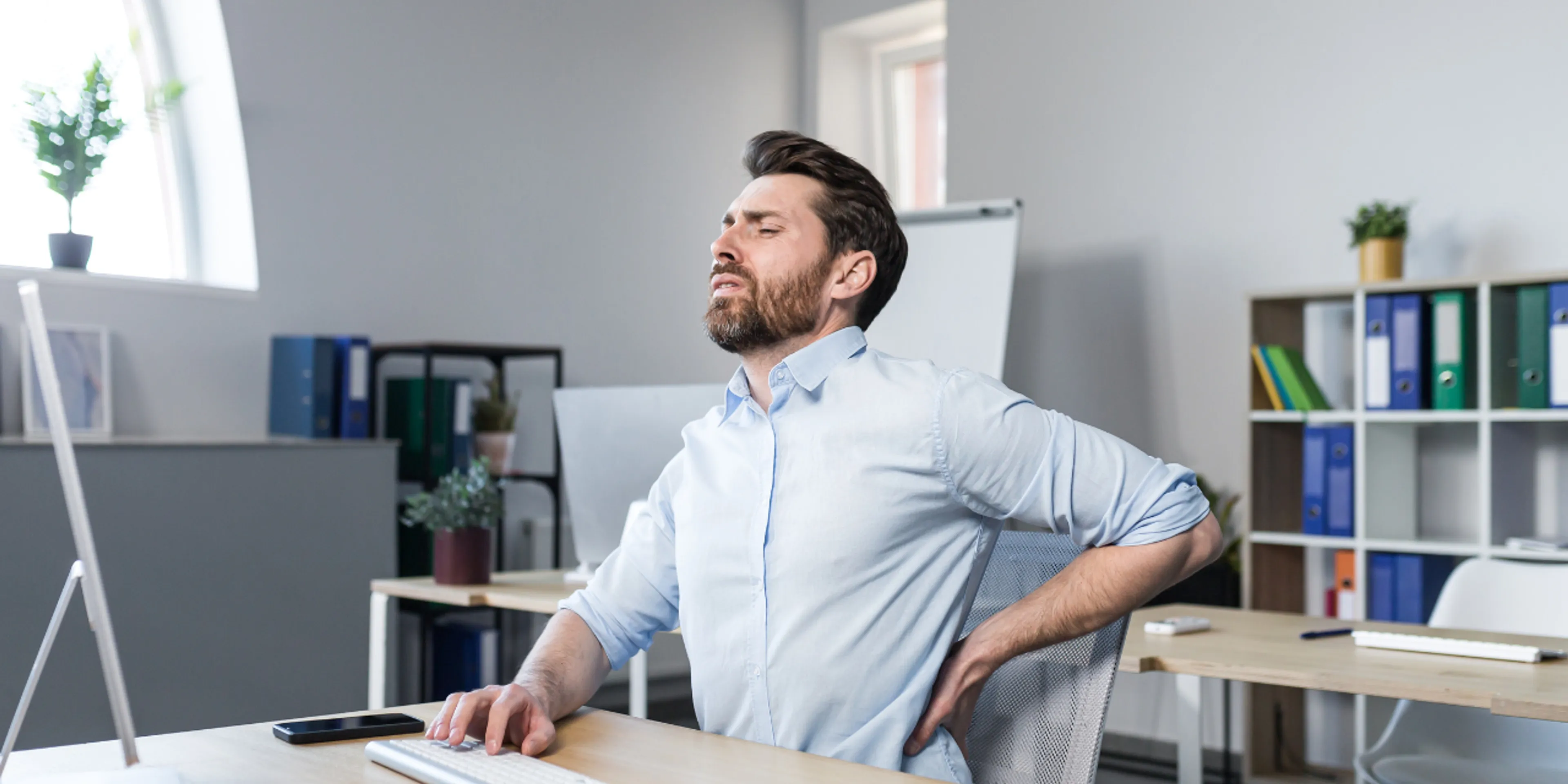 Persona con dolor de espalda