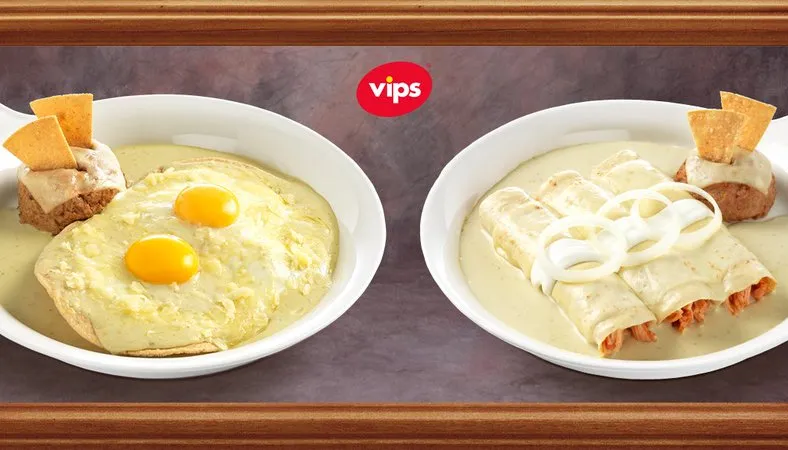 Huevos con frijoles y salsa suiza y totopos y enchiladas de pollo