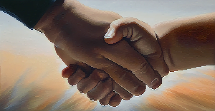 A close-up of a handshake representing trust and partnership in therapeutic settings.