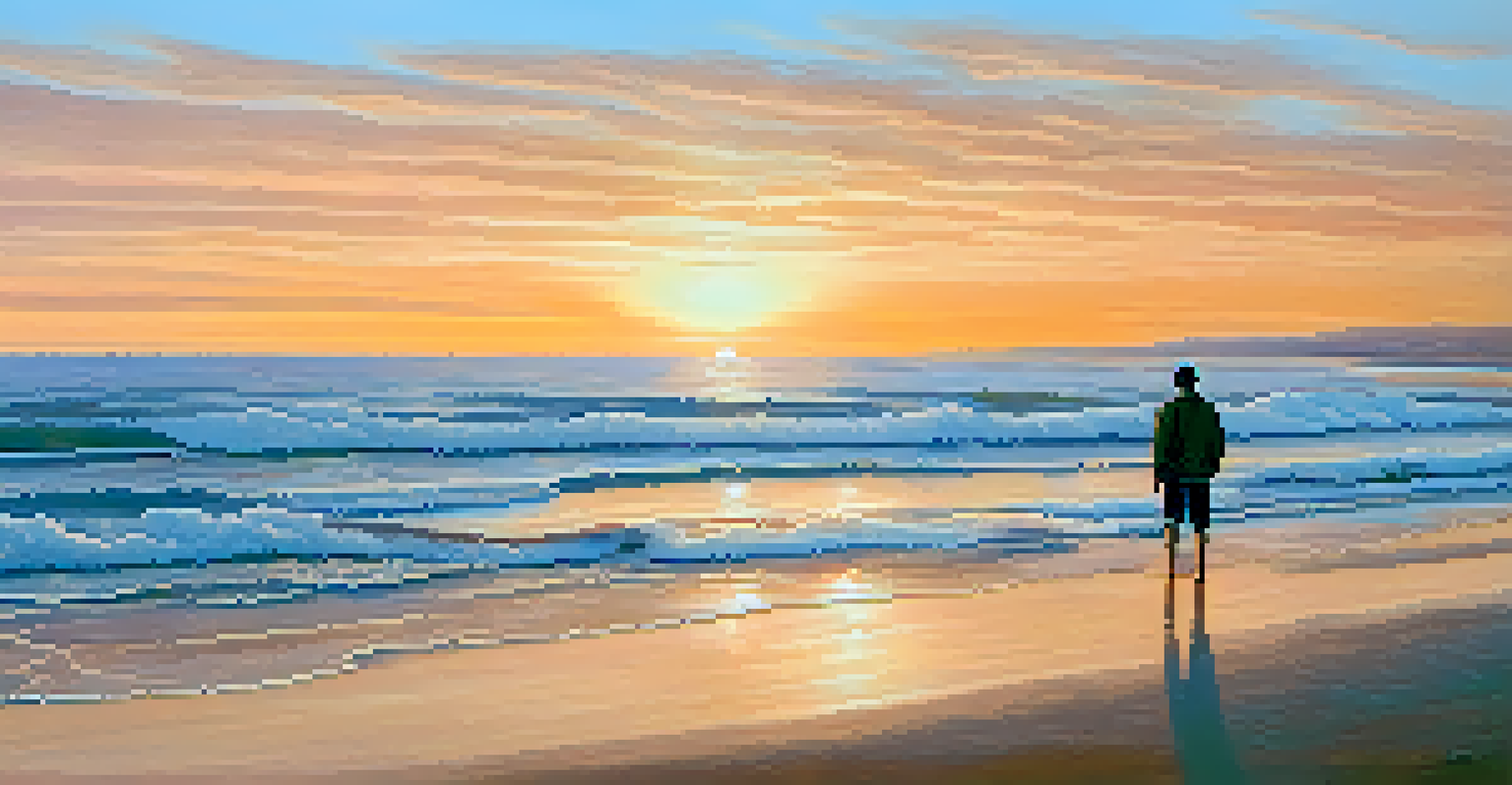 A tranquil beach at sunset with a person standing by the water's edge, looking at the horizon.