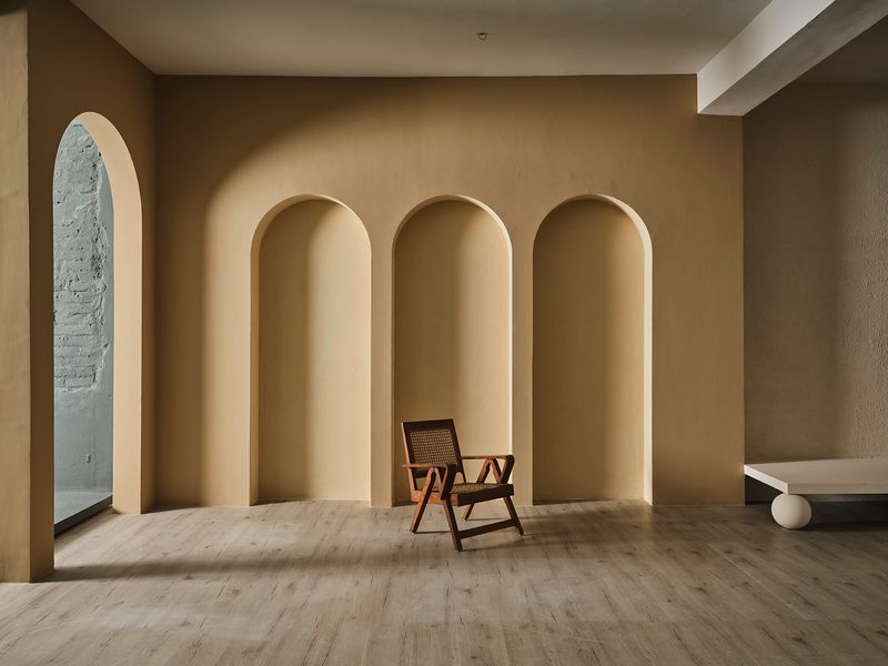 BOOKD lifestyle studio with modern arches and minimalist design elements