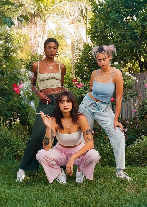 3 women posing in nature