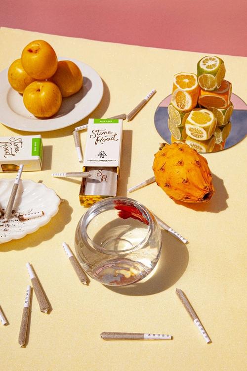 marijuana and fruits on table