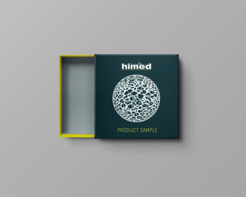 Branded scientific sample box on gray background with porous sphere graphic on front
