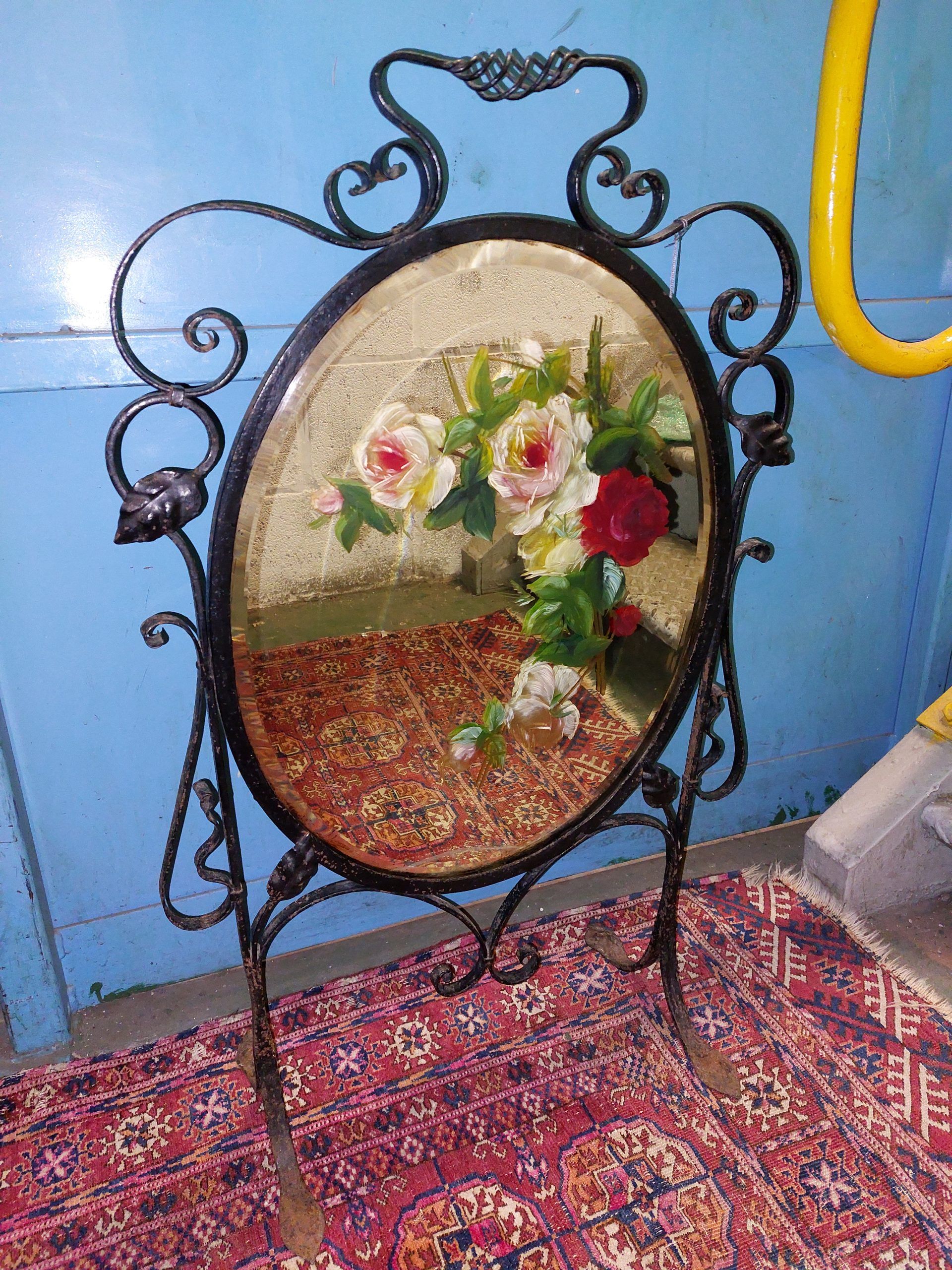 Wrought Iron Fire Screen With Hand Painted and Bevelled Edge Mirror