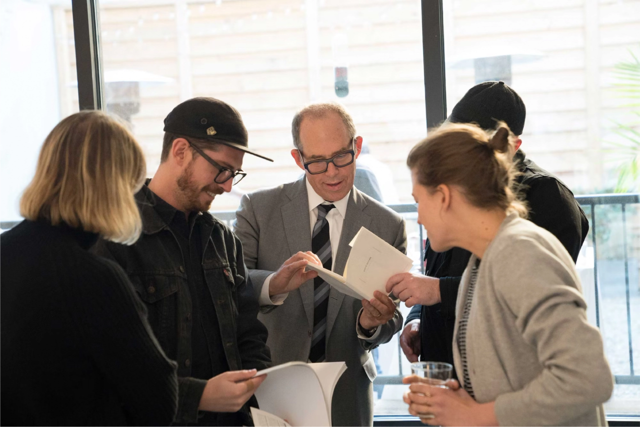 Bierut (center) and his team at the Pentagram offices. (Courtesy Pentagram)