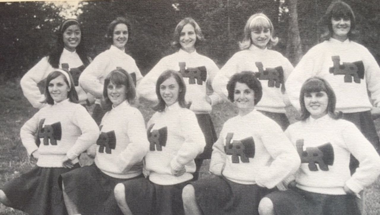 Black and white photo of a cheerleading squad