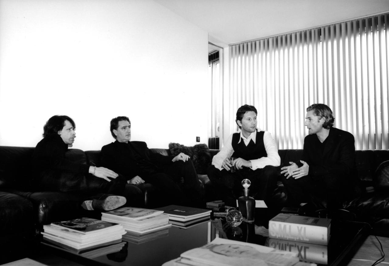 From left: Saville, Thomas Bried, Marc Meiré and Mike Meiré at “The Apartment” in 1995. (Courtesy Peter Saville)