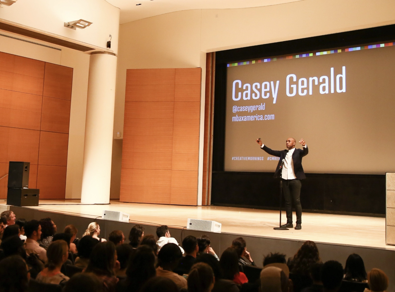 Casey Gerald, the co-founder and CEO of MBAs Across America, speaking at a Creative Mornings event in New York City in 2015. (Courtesy Tina Roth Eisenberg)
