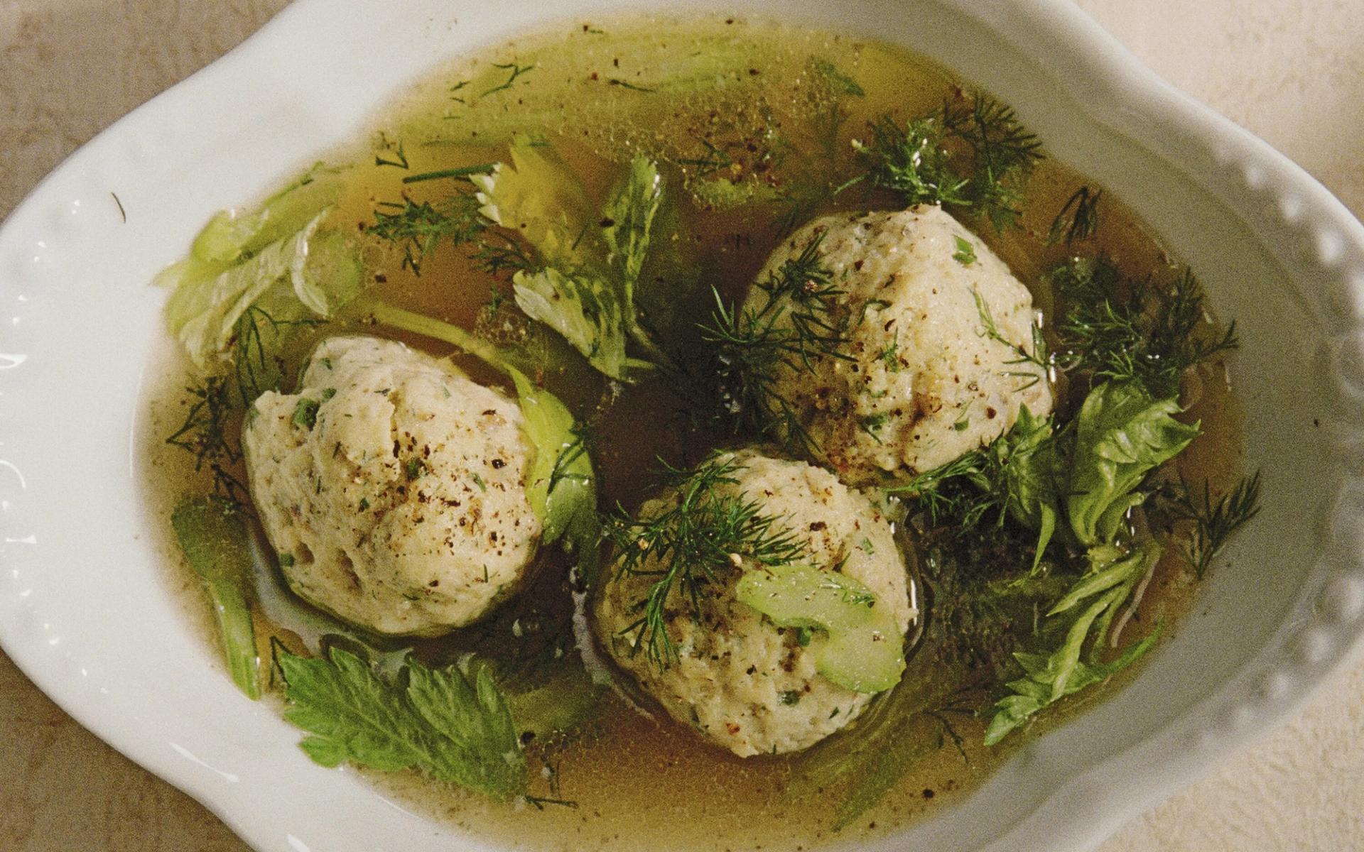 A bowl of Roman’s matzo ball soup. (Photo: Chris Bernabeo/Courtesy Clarkson Potter)