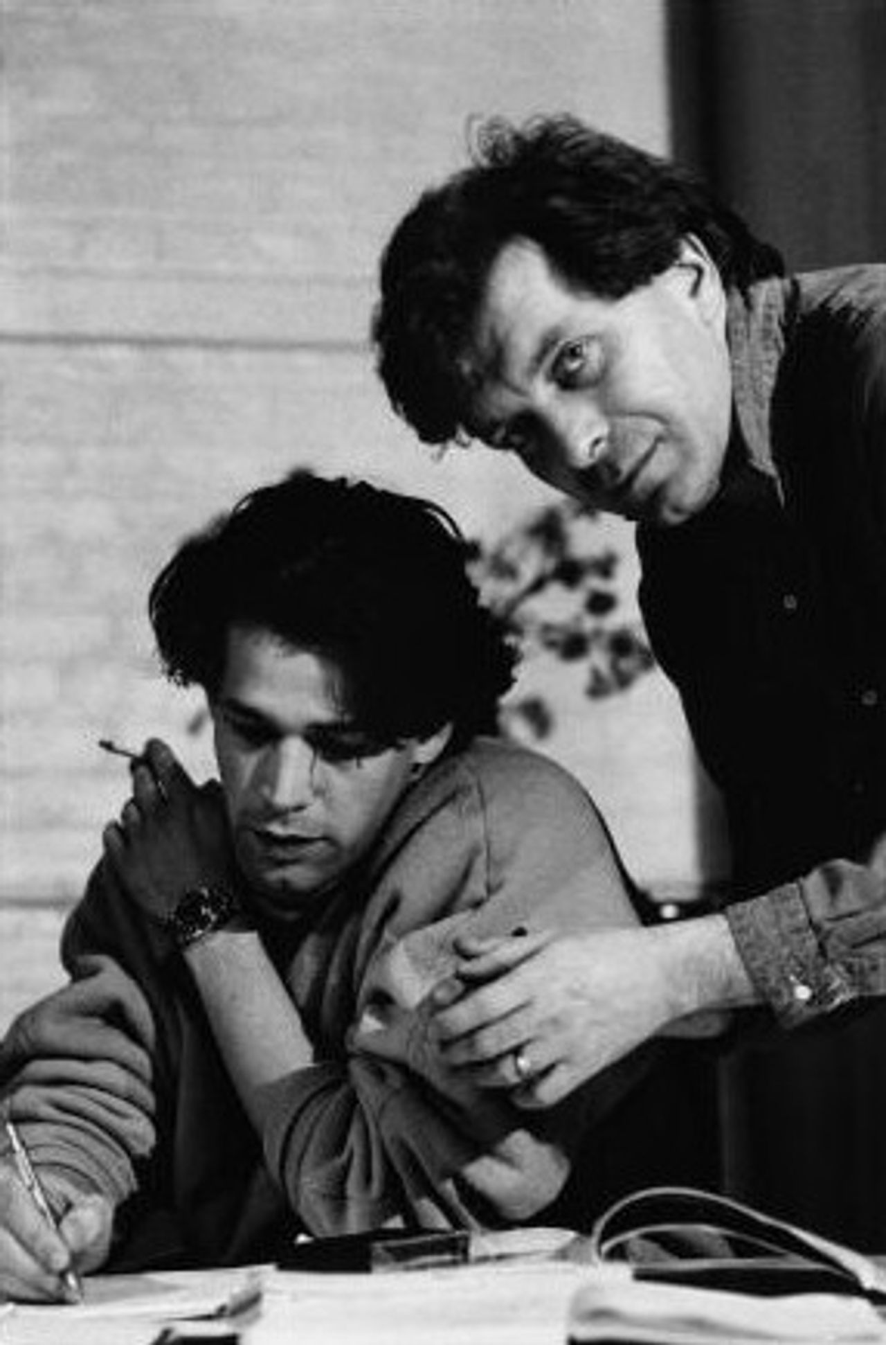 Saville (left) with Tony Wilson (right) at PSA Studio in London in 1980. (Photo: Peter Anderson. Courtesy Peter Saville)