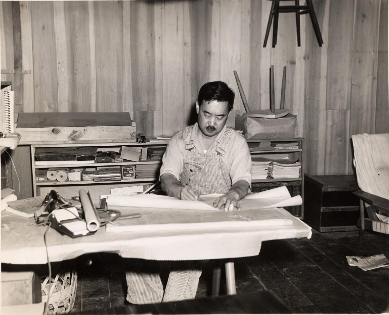 George sketching in his office in 1950. (Courtesy George Nakashima Woodworkers)
