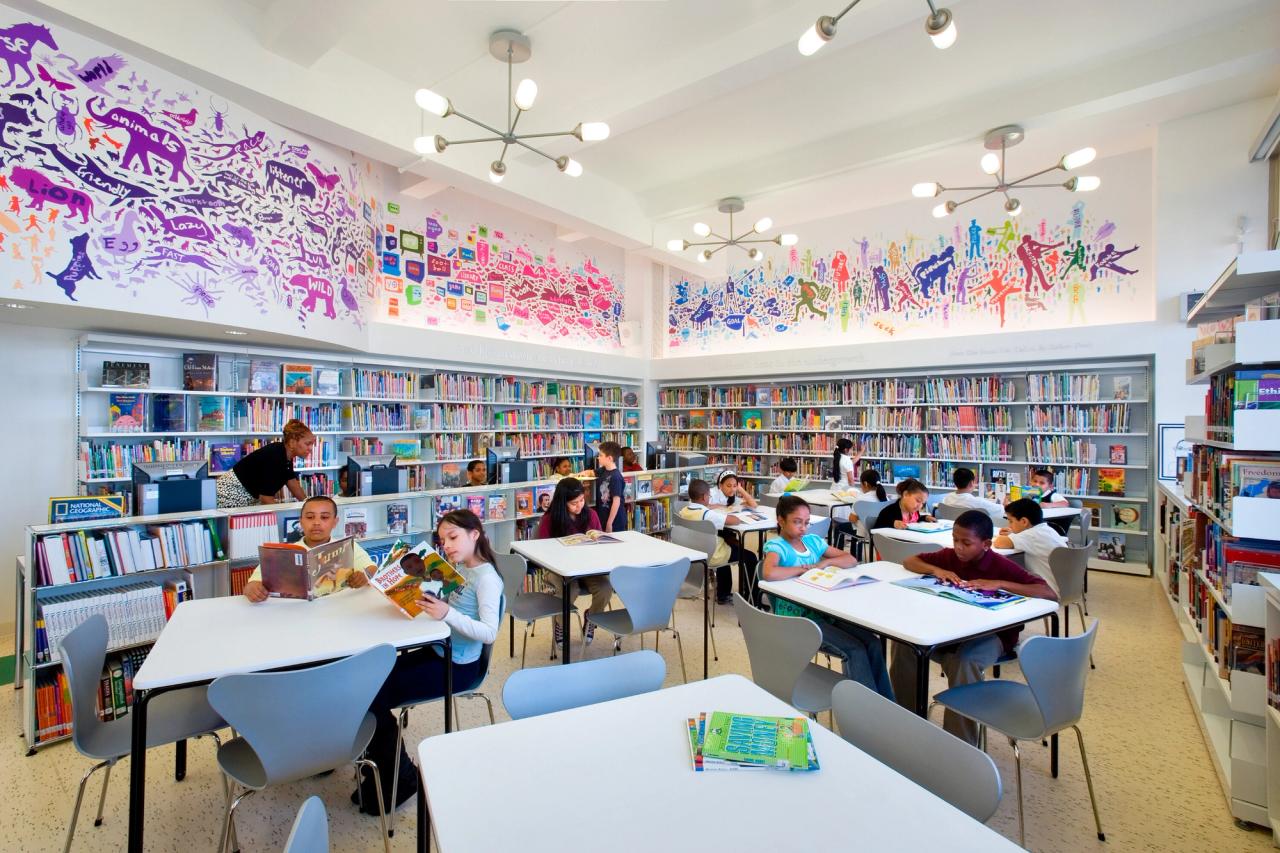 The Robin Hood Foundation library at P.S. 196X, designed in collaboration with the graphic designer Rafael Esquer. (Photo: Kevin Chu and Jessica Paul. Courtesy Pentagram)