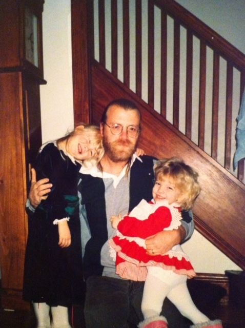 Saunders as a young father with his two daughters. (Courtesy George Saunders)