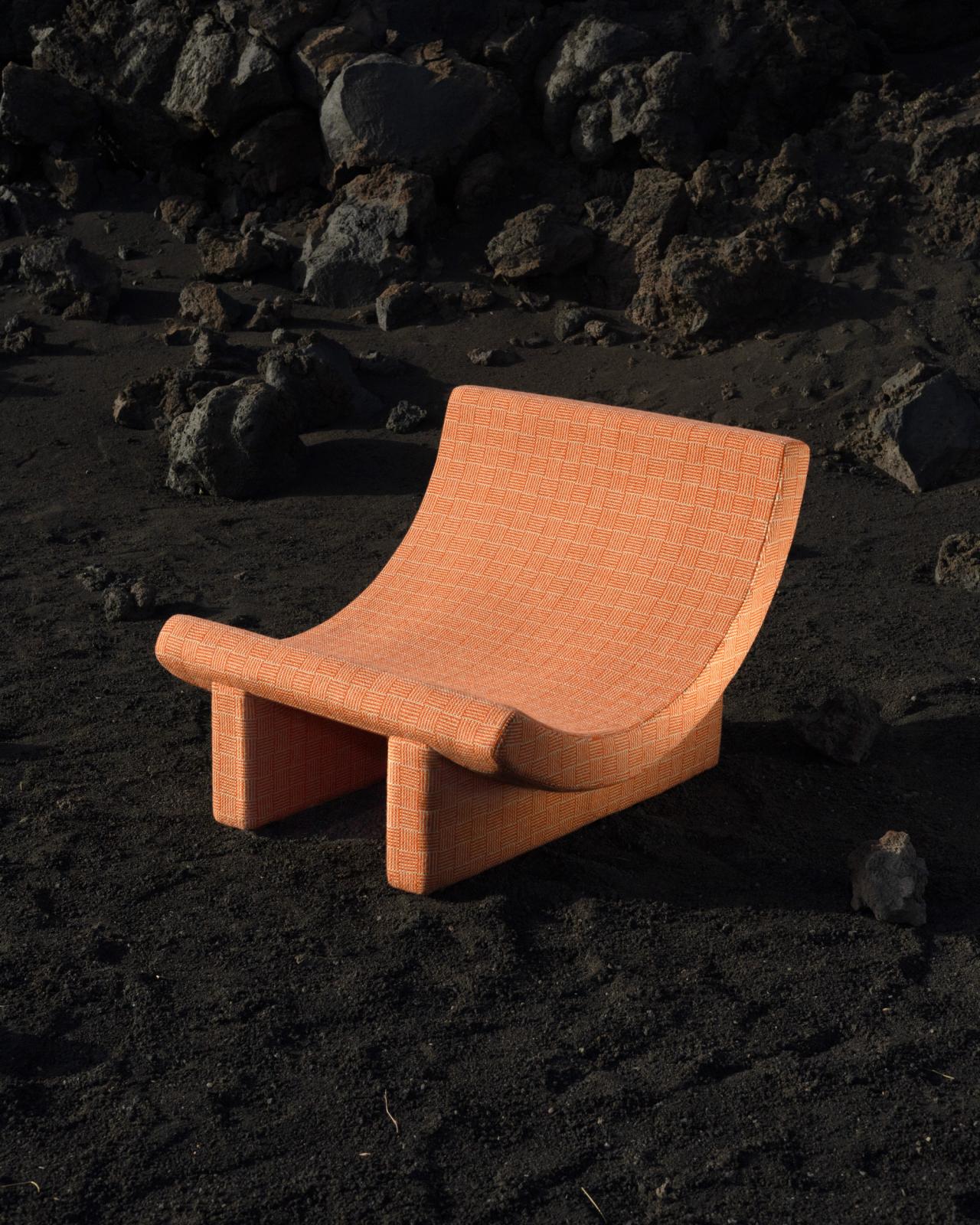 “Altiplano” (1966) by Sheila Hicks shown in color 004 Hearth upholstered on the Trench chair by Philippe Malouin for Acerbis. (Photo: Fabio Gueli and Ibrahim Kombarji/Courtesy Knoll Textiles)
