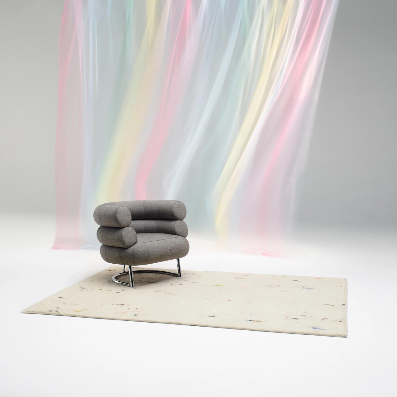 A curtain, rug, and chair upholstery from Peter Saville’s Technicolour collection with Kvadrat. (Courtesy Kvadrat)