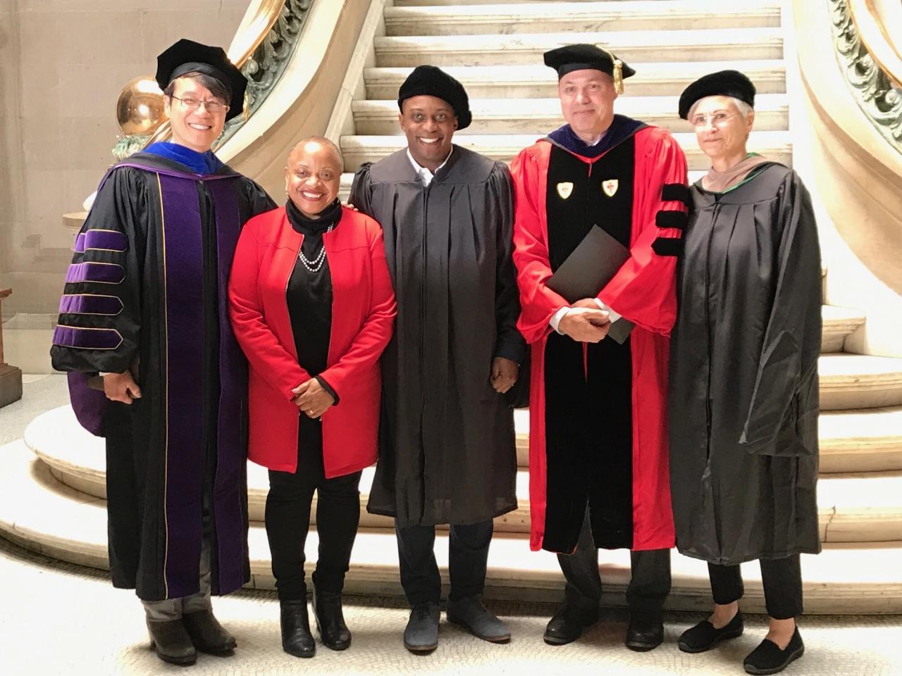 Thomas (center) with his mother (second to left) receiving his honorary doctorate degree at the Maryland Institute College of Art. (Courtesy Hank Willis Thomas)