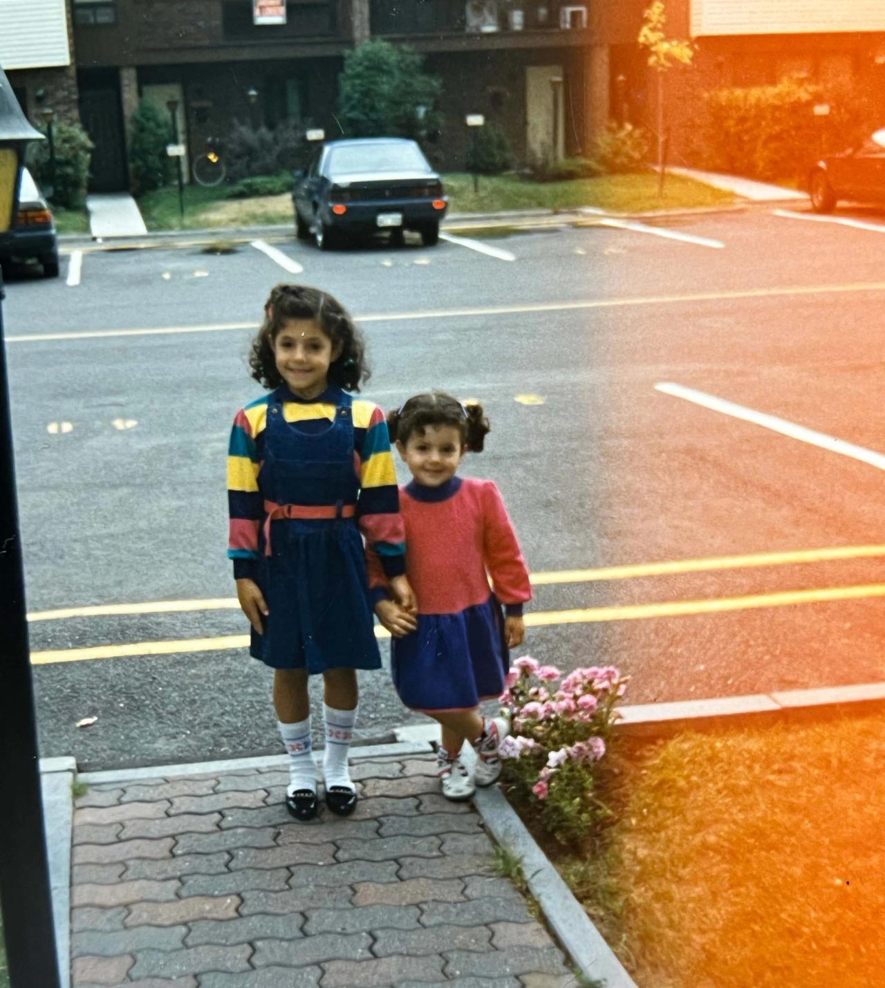 Semaan (left) and her younger sister, Laeticia, as children in Beirut. (Courtesy Céline Semaan)