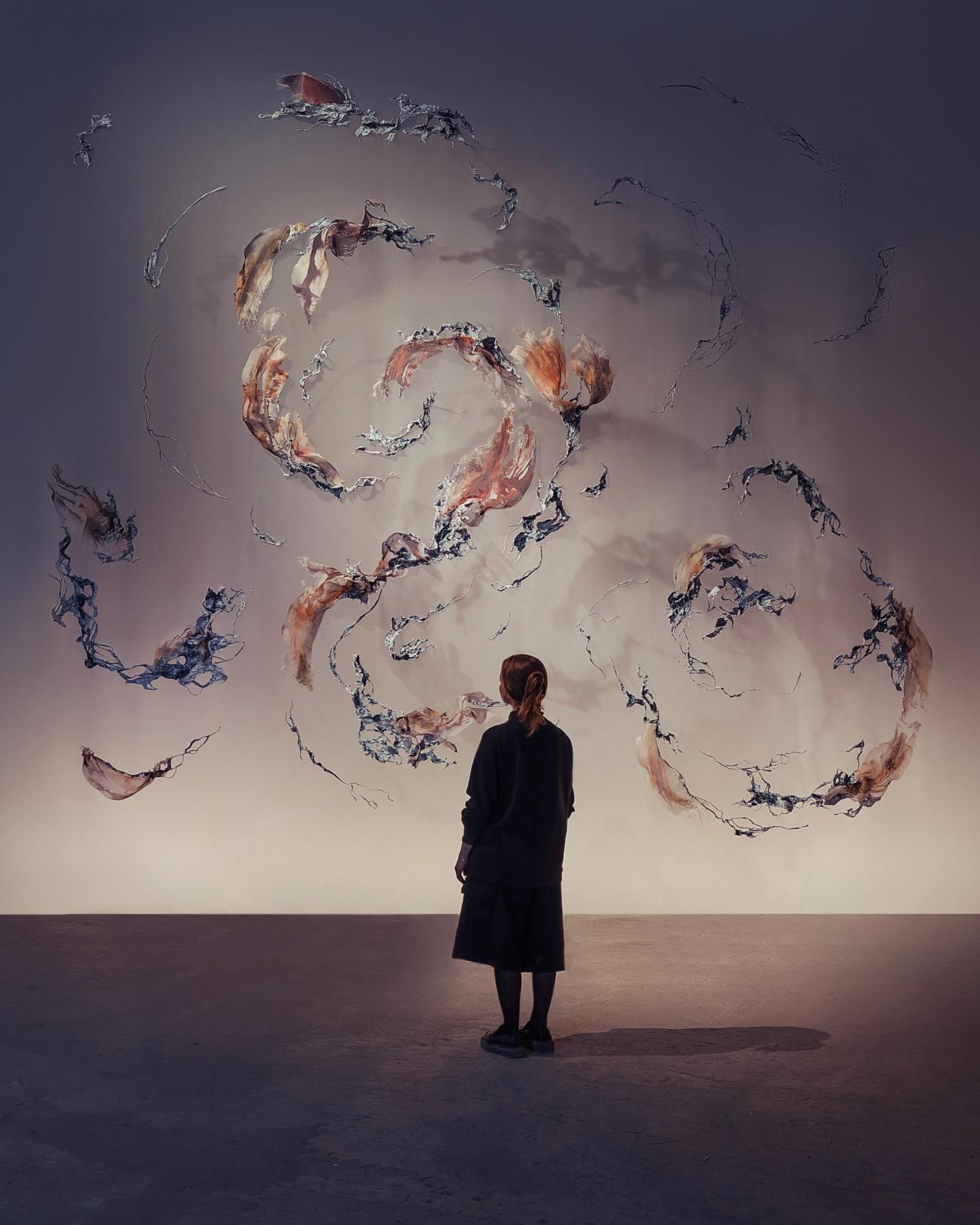 Installation view of “Weightlessness of the Unknown,” an aerial sculpture shown alongside couture looks as part of van Herpen’s 2023 Hybrid show. (Photo: Franck Bohbot)