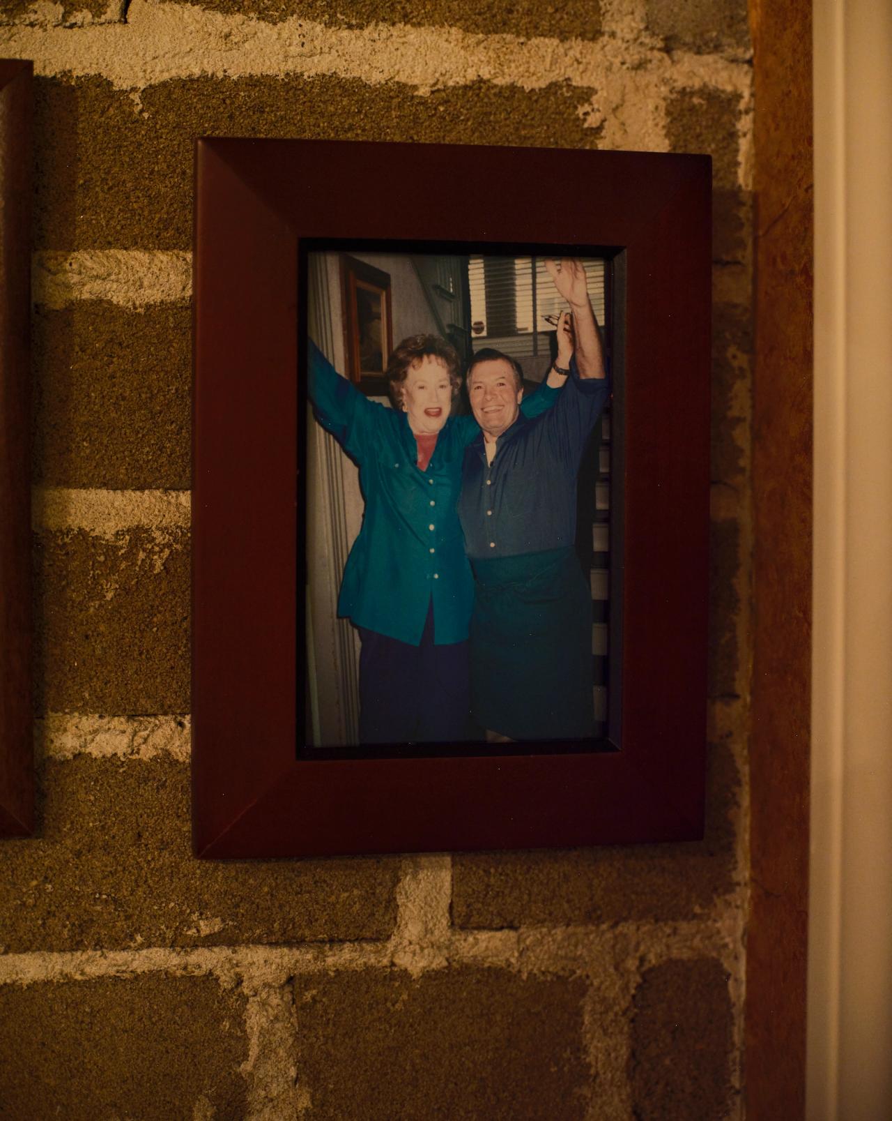 A framed photograph of Pépin with Julia Child, his friend and fellow chef. (Photo: Matthew Harrington for The Slowdown)