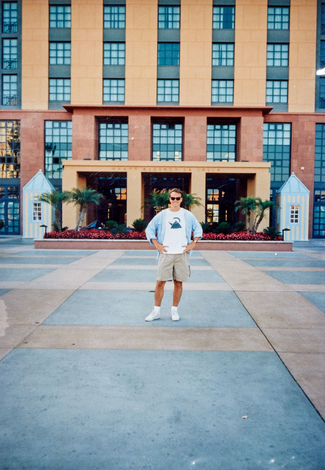 Hoke in front of the Hyatt Regency Hotel (designed by Michael Graves) in La Jolla, California in 1991. (Courtesy John Hoke)