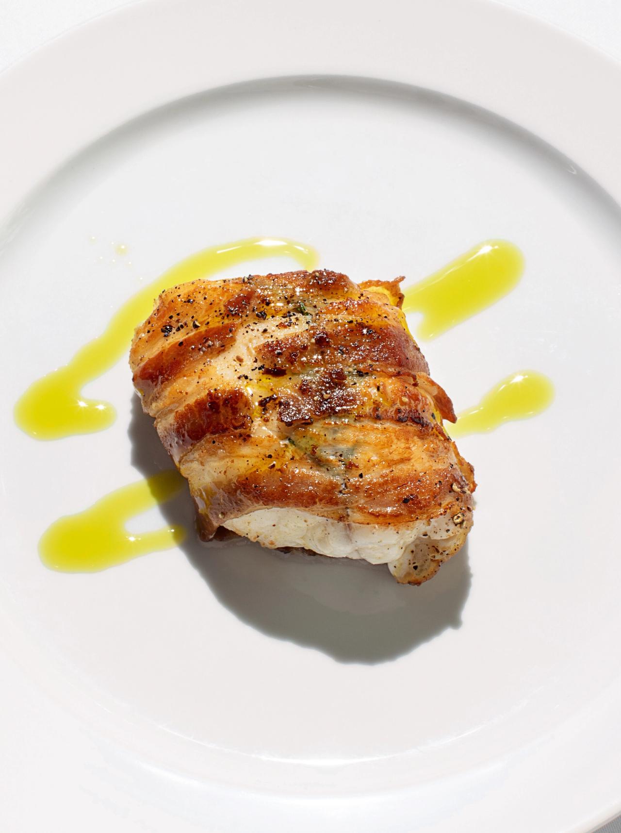The River Cafe’s monkfish wrapped in pancetta. (Courtesy Phaidon)