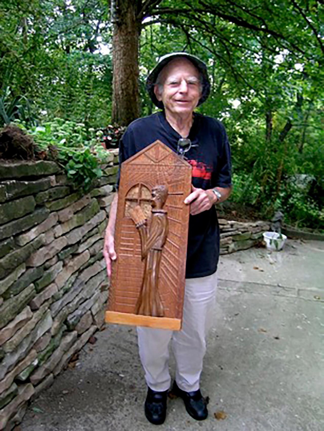 Adamson’s grandfather with one of his wood carvings. (Courtesy Glenn Adamson)