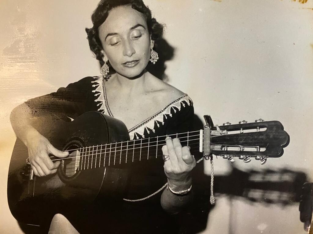 Broza’s mother playing the guitar. (Courtesy David Broza)