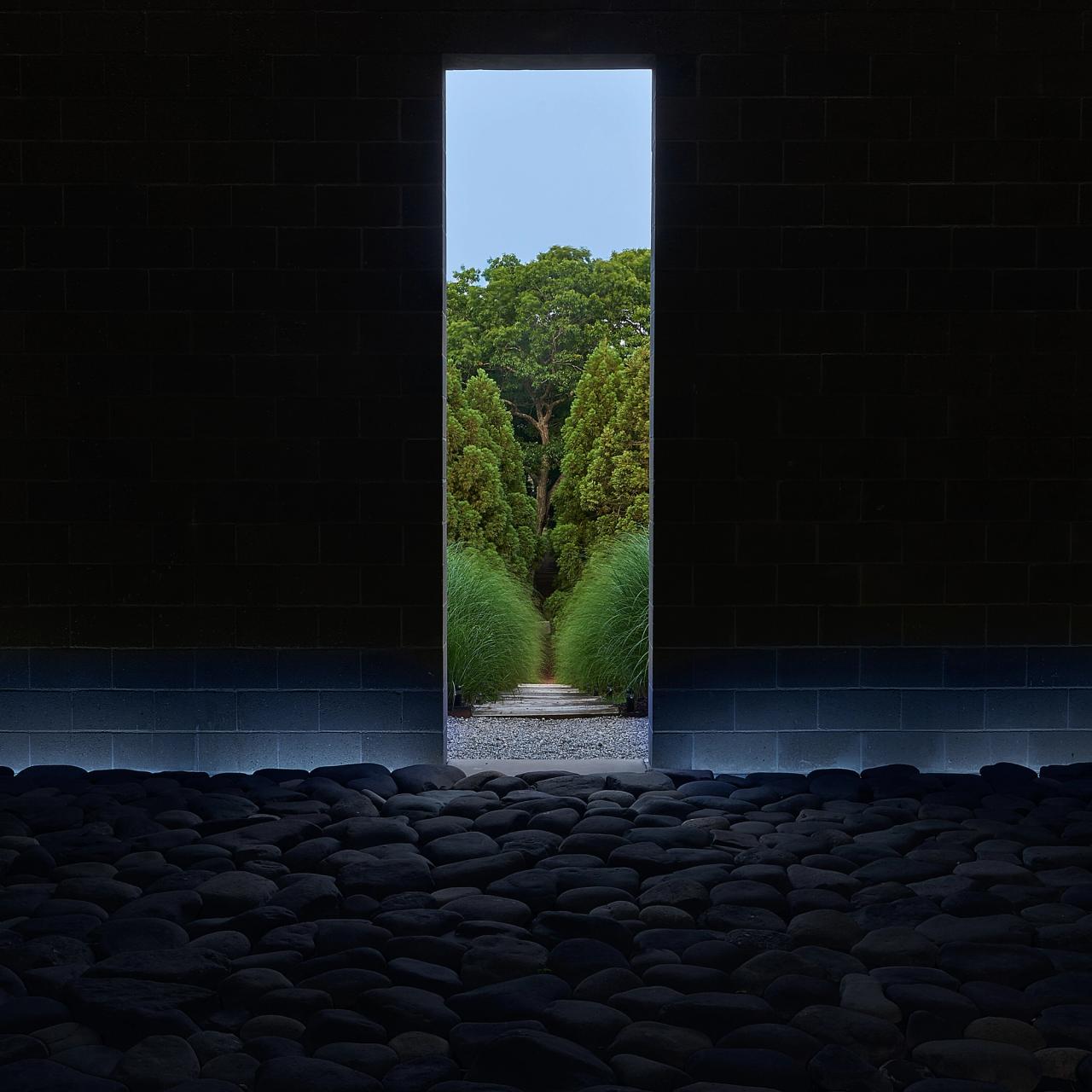 The grounds of The Watermill Center as seen through “The Knee” building entrance. (Photo: Kristian Kruuser. Courtesy The Watermill Center)