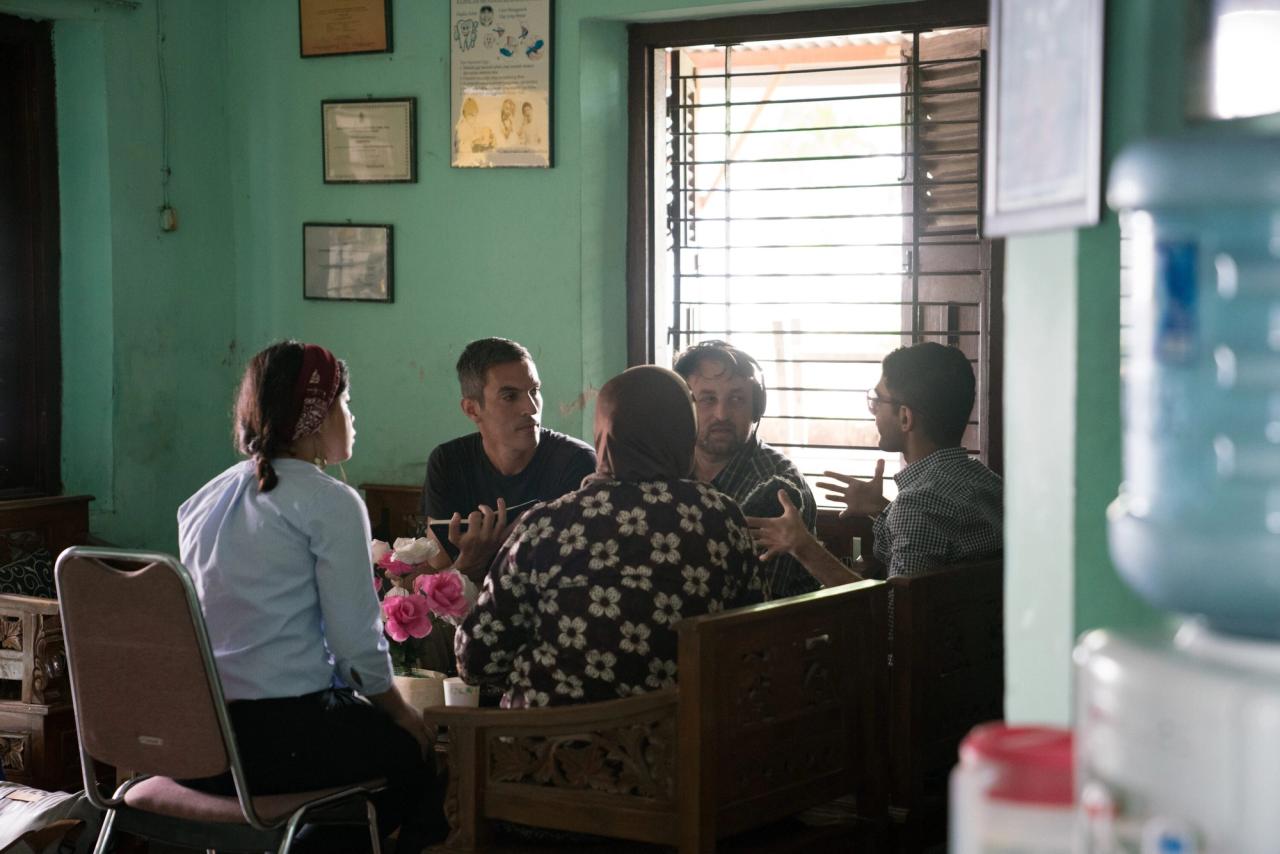 Shapiro (second from left) conducting an interview in Indonesia in 2016. (Courtesy Ari Shapiro)