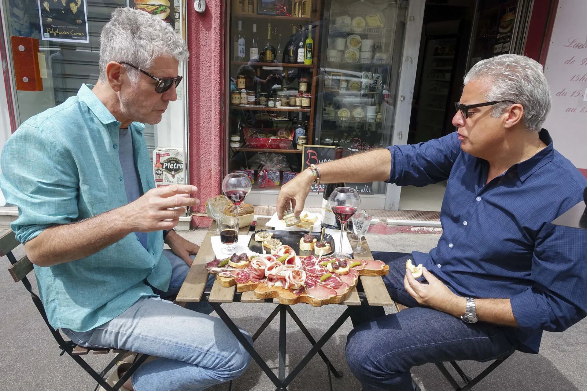 Ripert (right) dining with the late chef Anthony Bourdain (left) in Marseille, France, on Bourdain’s former CNN show Parts Unknown. (Courtesy CNN)