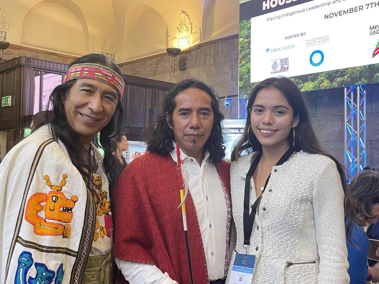 Bastida (right) with her father, Mindahi (center), and a fellow Indigenous leader at COP26. (Courtesy Xiye Bastida)