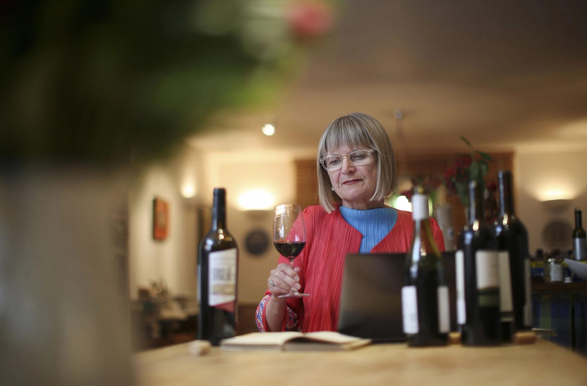 Robinson conducting a wine tasting. (Courtesy Jancis Robinson)