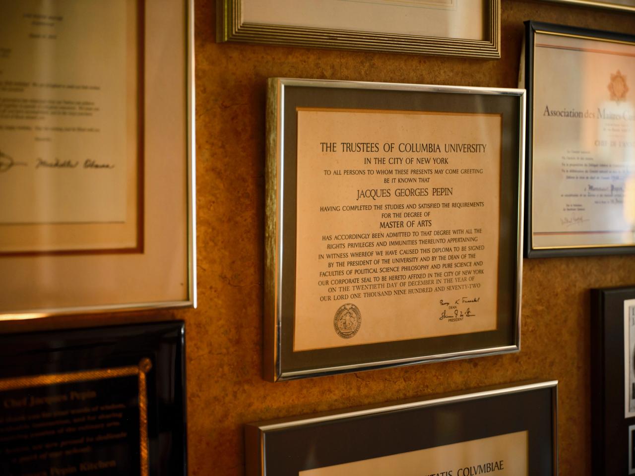 Pépin’s framed M.A. degree in 18th-century French literature, which he earned at Columbia University in 1972. (Photo: Matthew Harrington for The Slowdown)