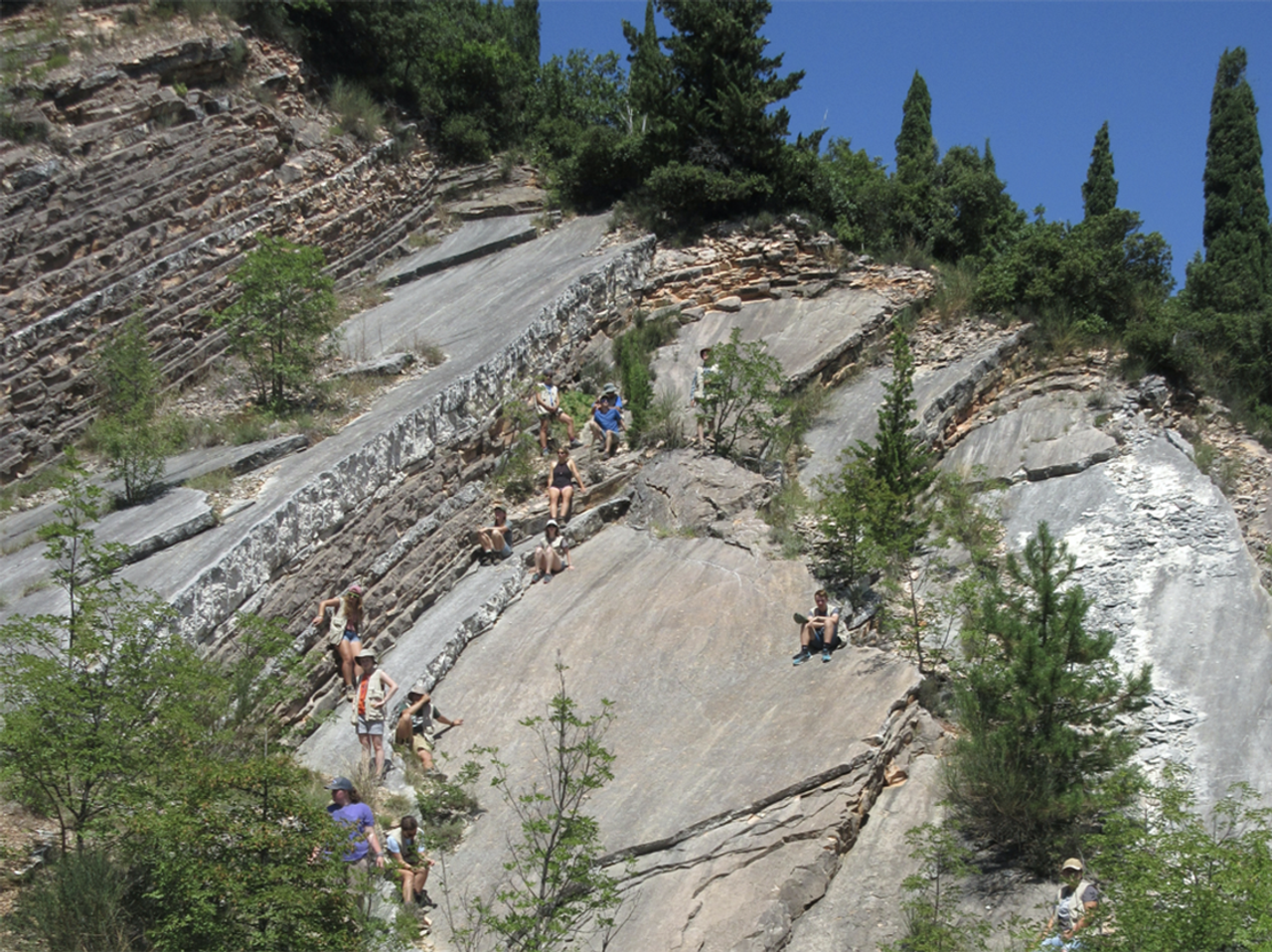 Bjornerud’s students on Cretaceous limestones on the field course in Italy in 2016. (Courtesy Marcia Bjornerud)