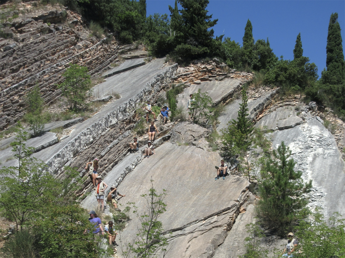 Bjornerud’s students on Cretaceous limestones on the field course in Italy in 2016. (Courtesy Marcia Bjornerud)