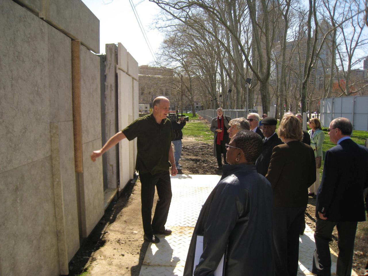 Architect Tod Williams shows stone samples of a building he is designing in Philadelphia