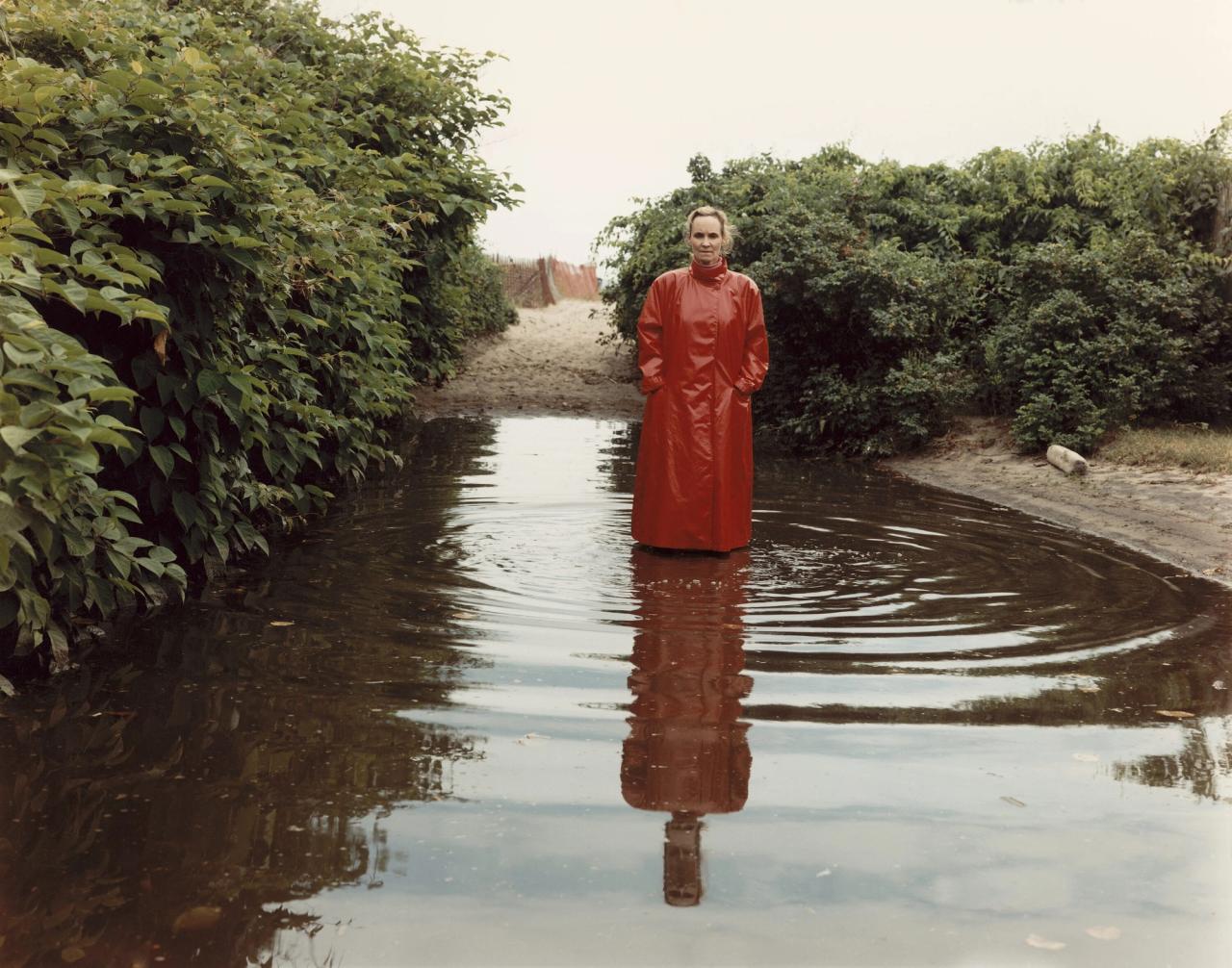 “Self-Portrait (Red Raincoat)” 1991 by Tina Barney. (Courtesy the artist and Kasmin, New York)
