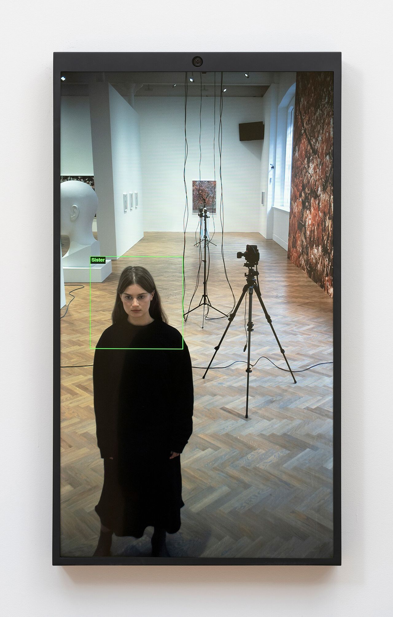 Woman in front of screen