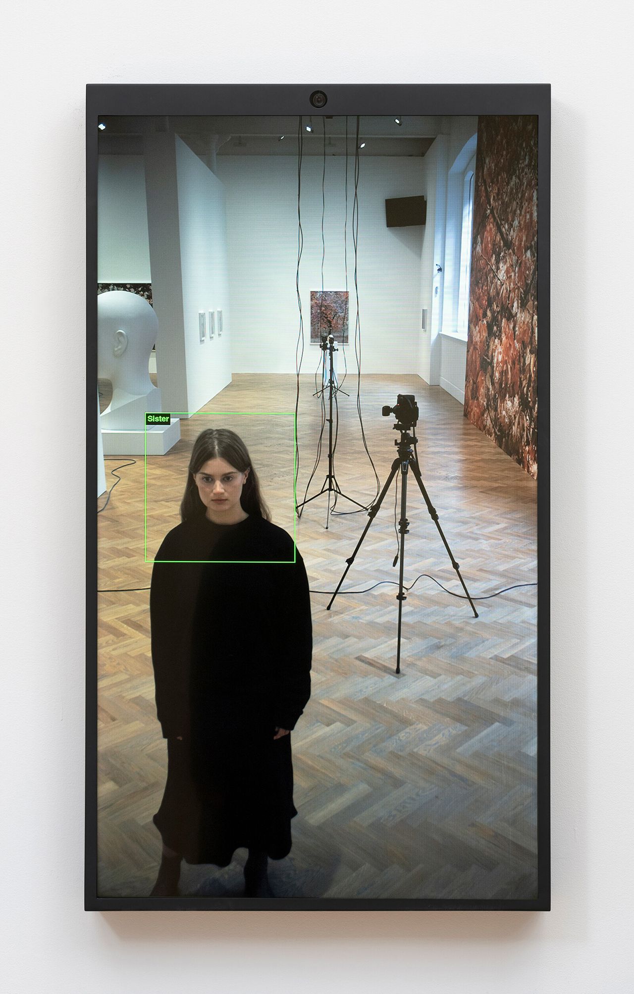Woman in front of screen