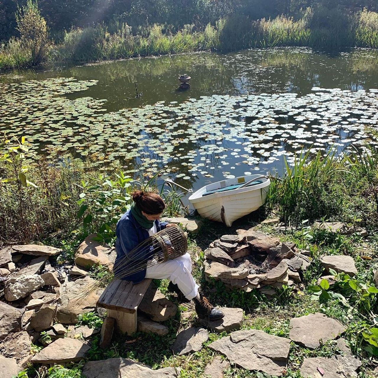 Needleman weaving a basket at her friend Sarah Ryhanen’s farm, World’s End, in Esperance, New York. (Courtesy Deborah Needleman)