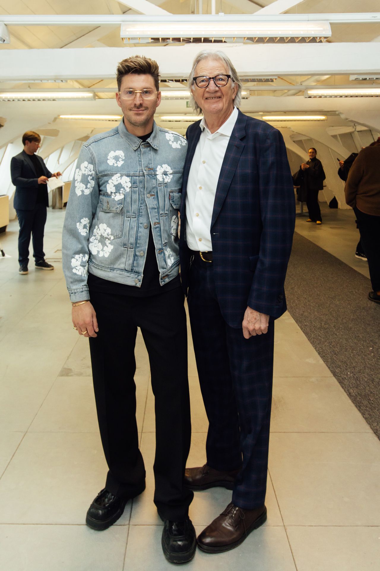 Smith (right) with the designer Henry Holland at Smithfield Studio. (Courtesy Paul Smith)