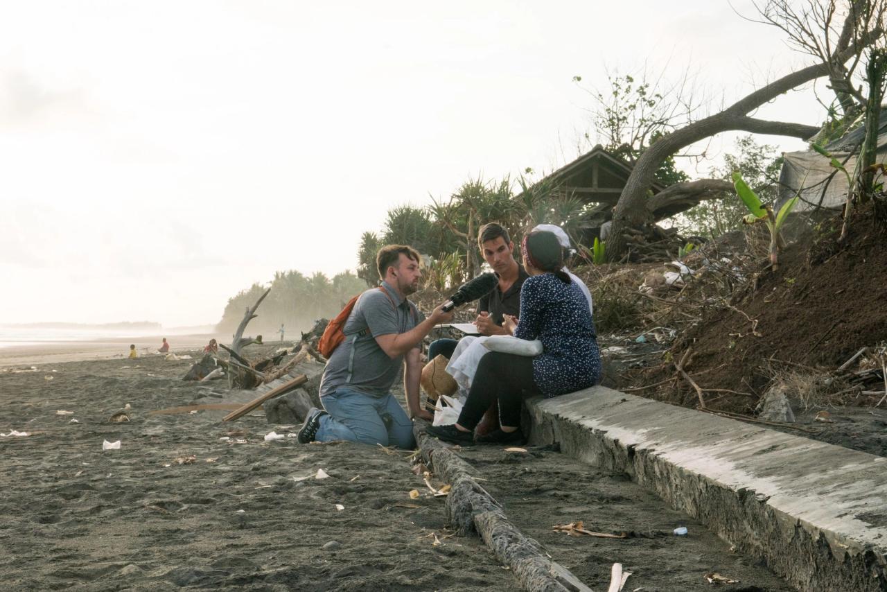 Shapiro (center) conducting an interview in Indonesia in 2016. (Courtesy Ari Shapiro)