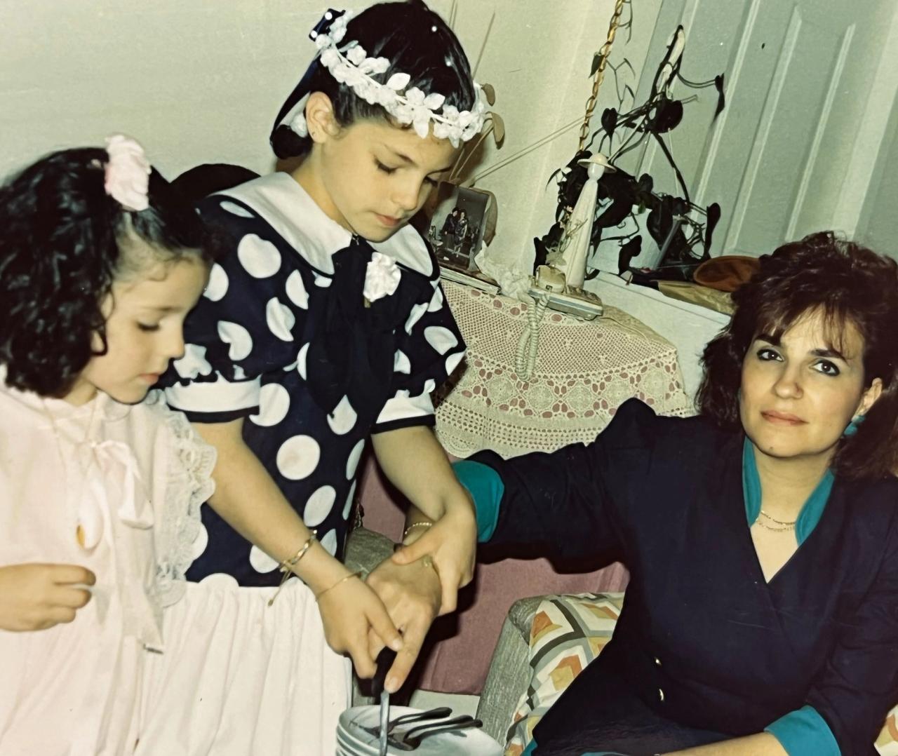 Semaan (center) and her younger sister, Laeticia, with their mother in Montreal. (Courtesy Céline Semaan)